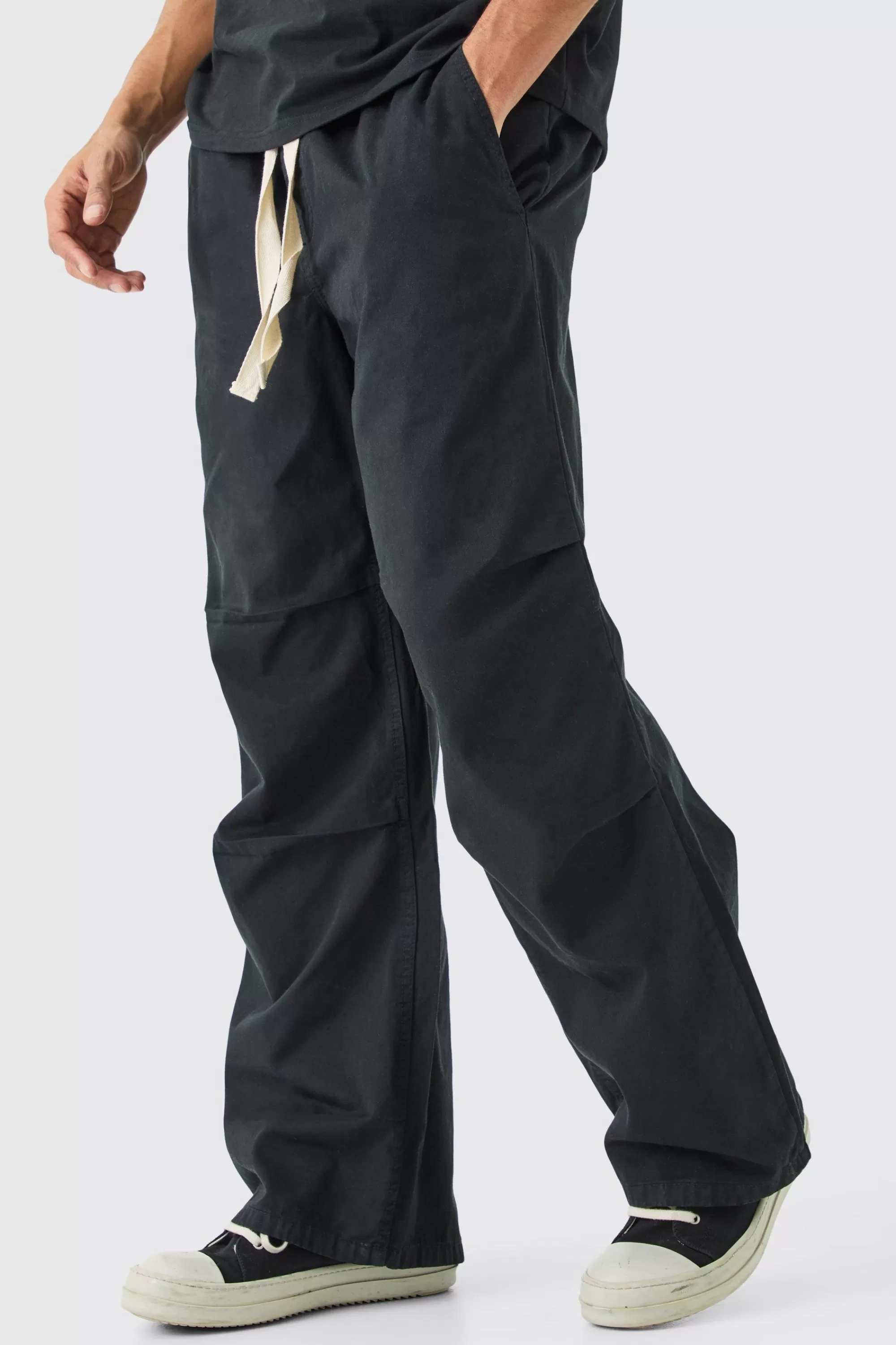 boohooMAN Elasticated Waist Contrast Drawcord Baggy Trouser | UK