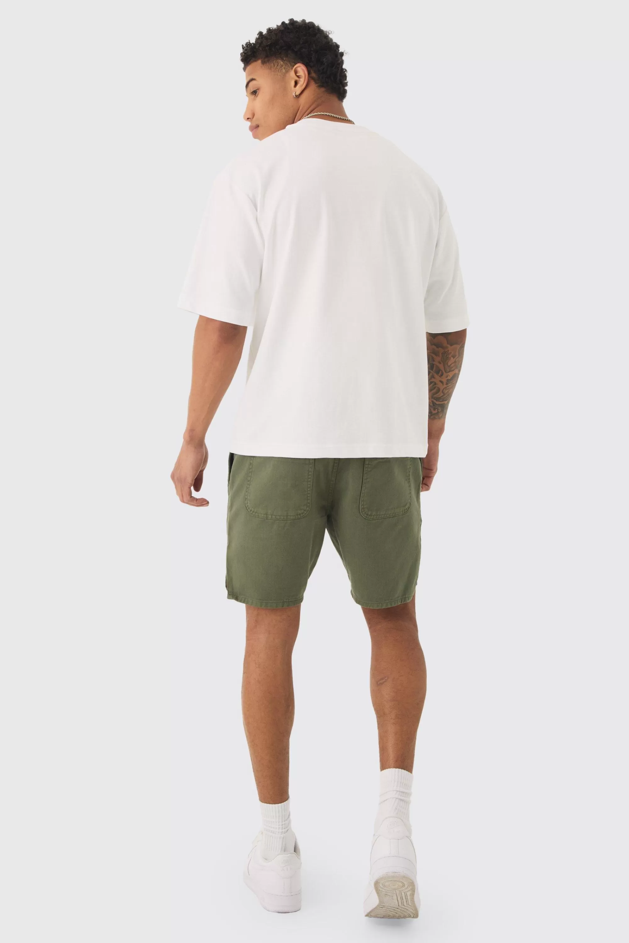 boohooMAN Elasticated Waist Contrast Drawcord Split Hem Shorts | UK