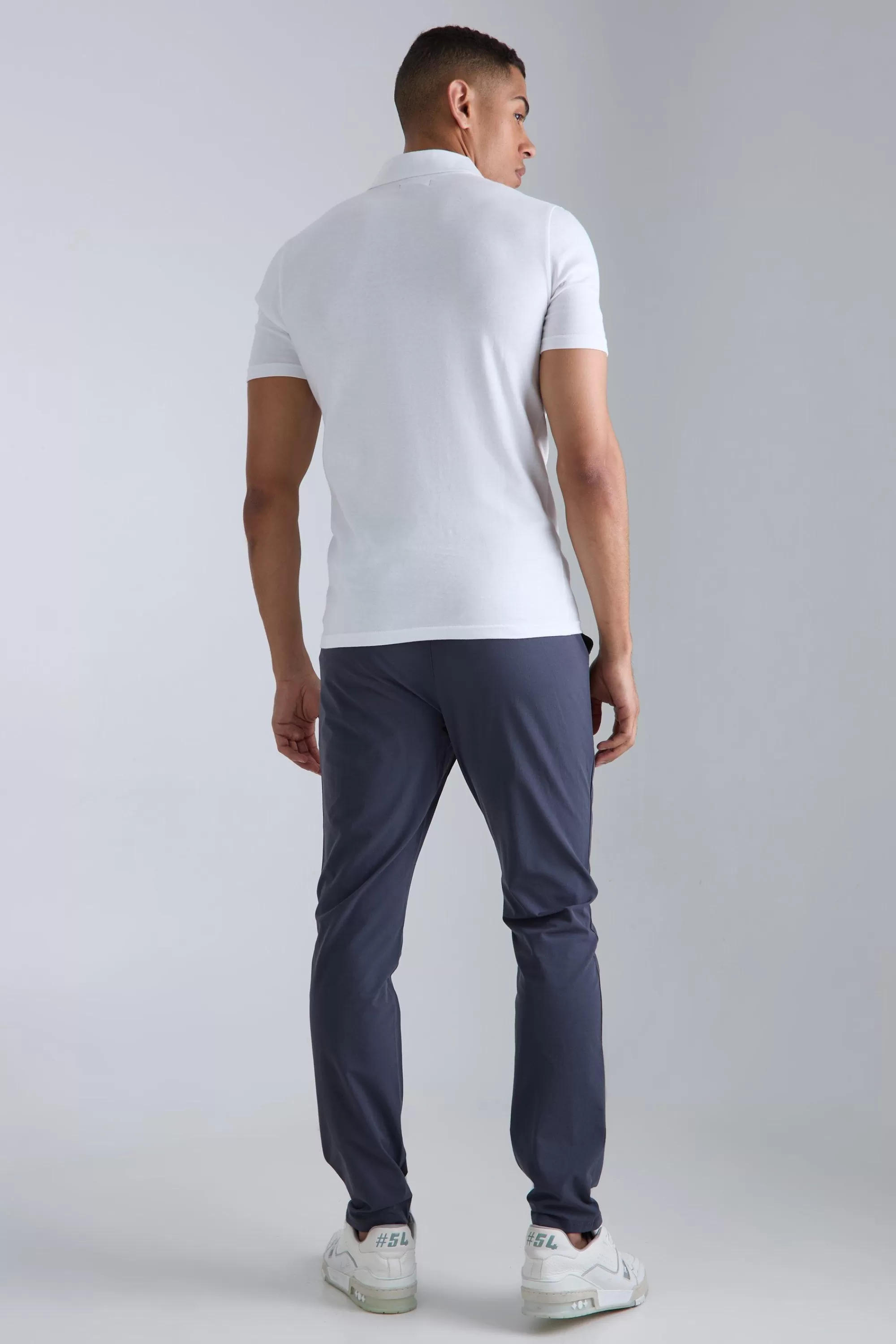 boohooMAN Elasticated Waist Golf Technical Stretch Slim Trouser | UK
