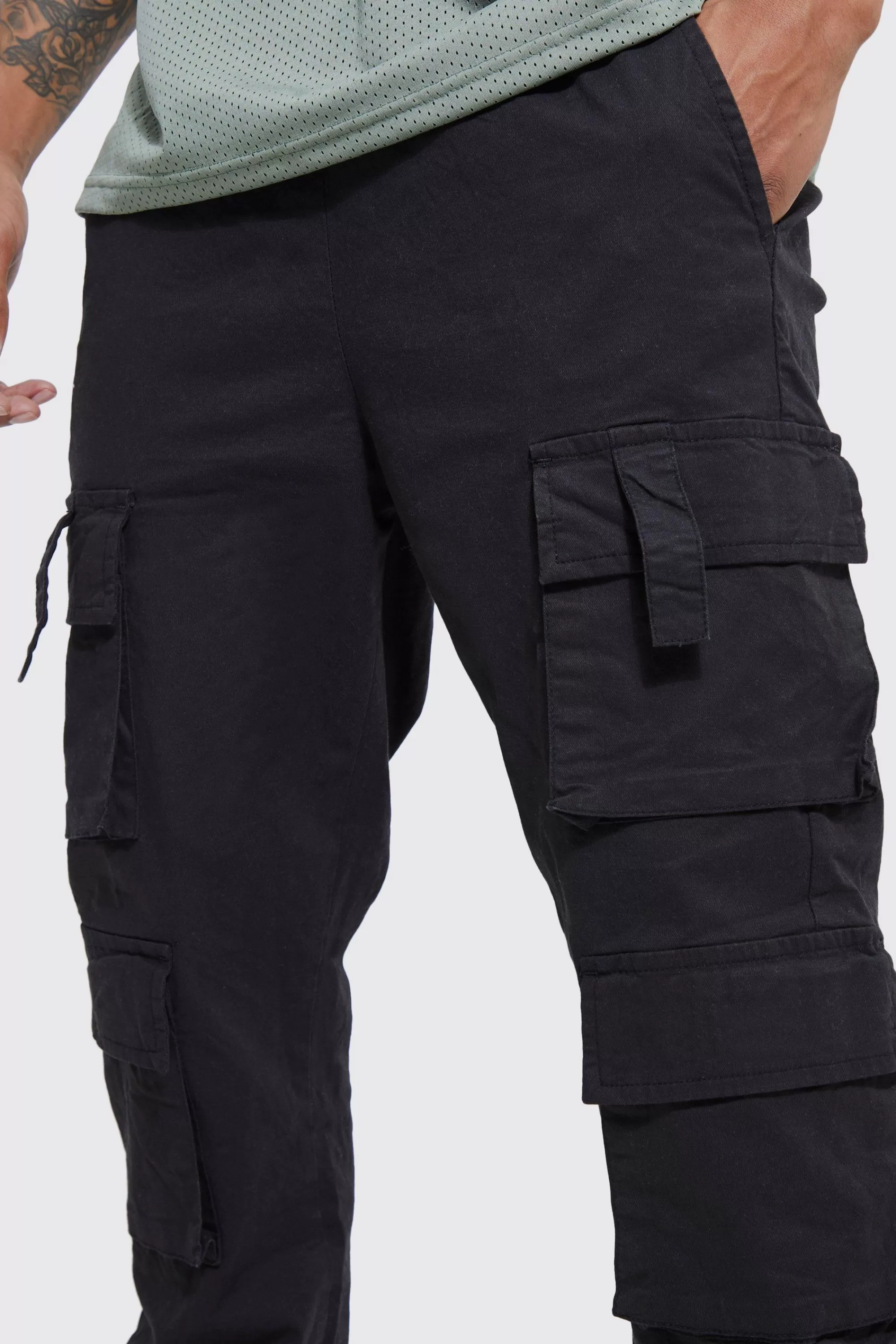 boohooMAN Elasticated Waist Multi Cargo Pocket Slim Fit Jogger | UK