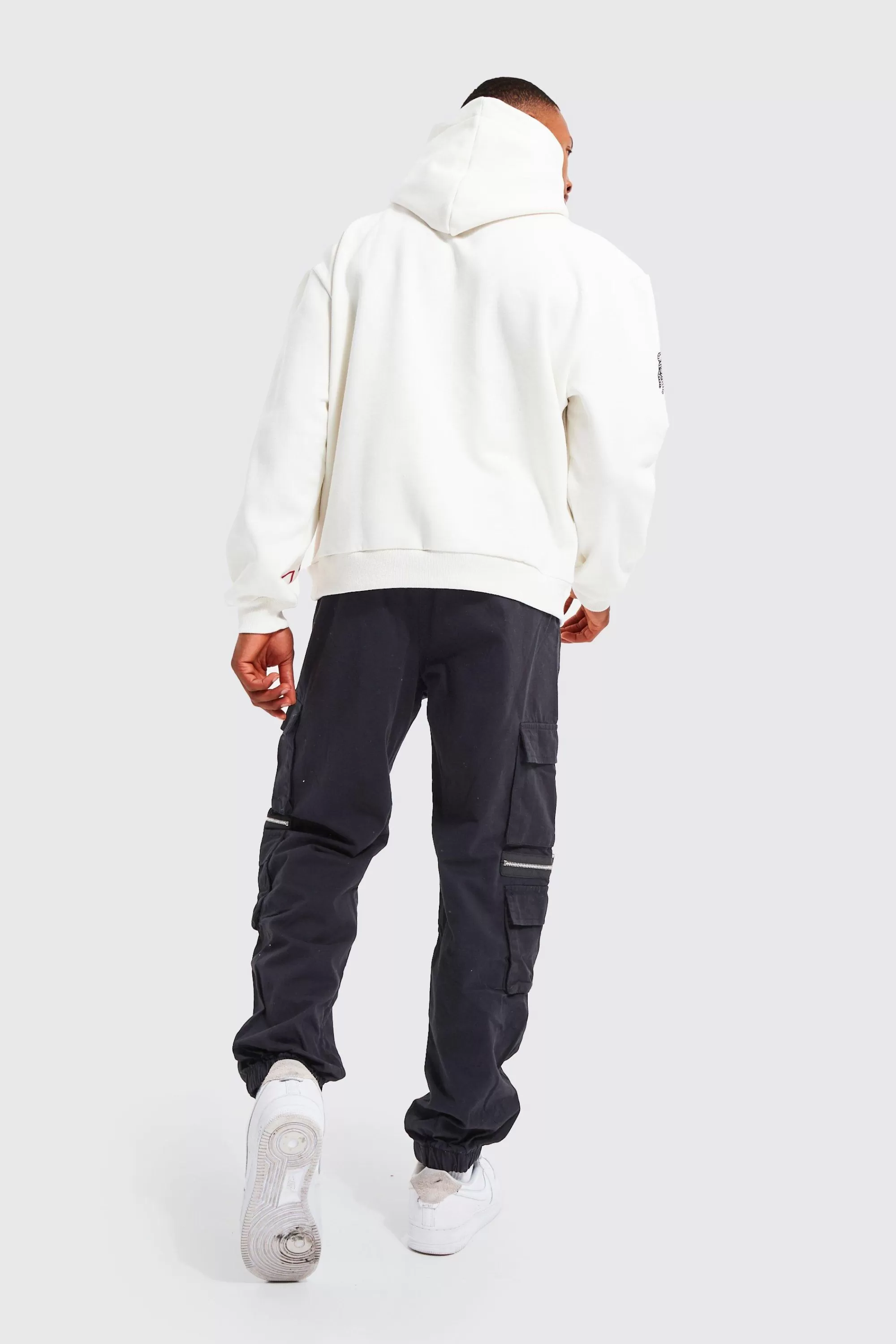 boohooMAN Elasticated Waist Multi Pocket Zip Cargo Trouser | UK
