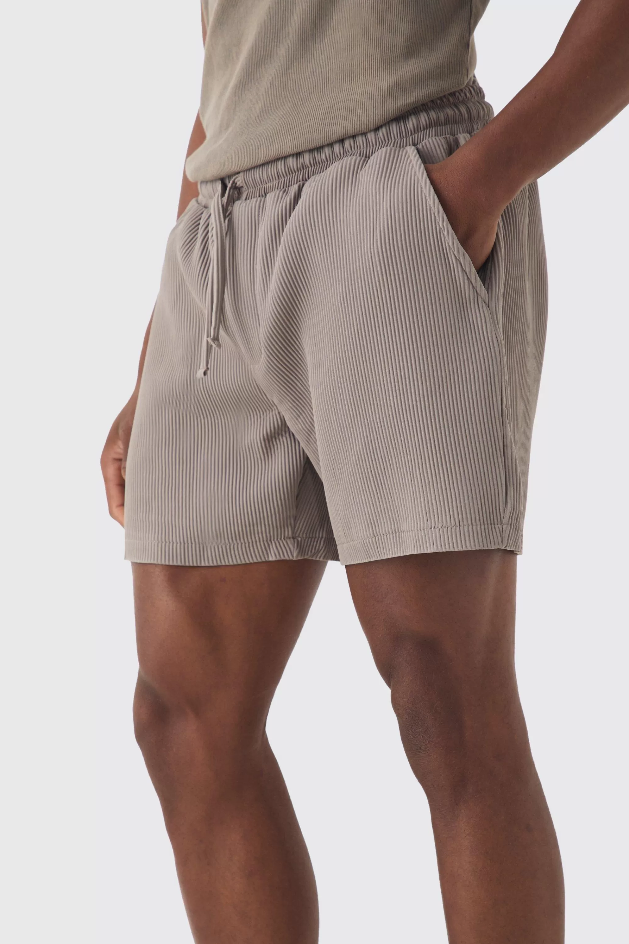 boohooMAN Elasticated Waist Pleated Drawcord Shorts | UK