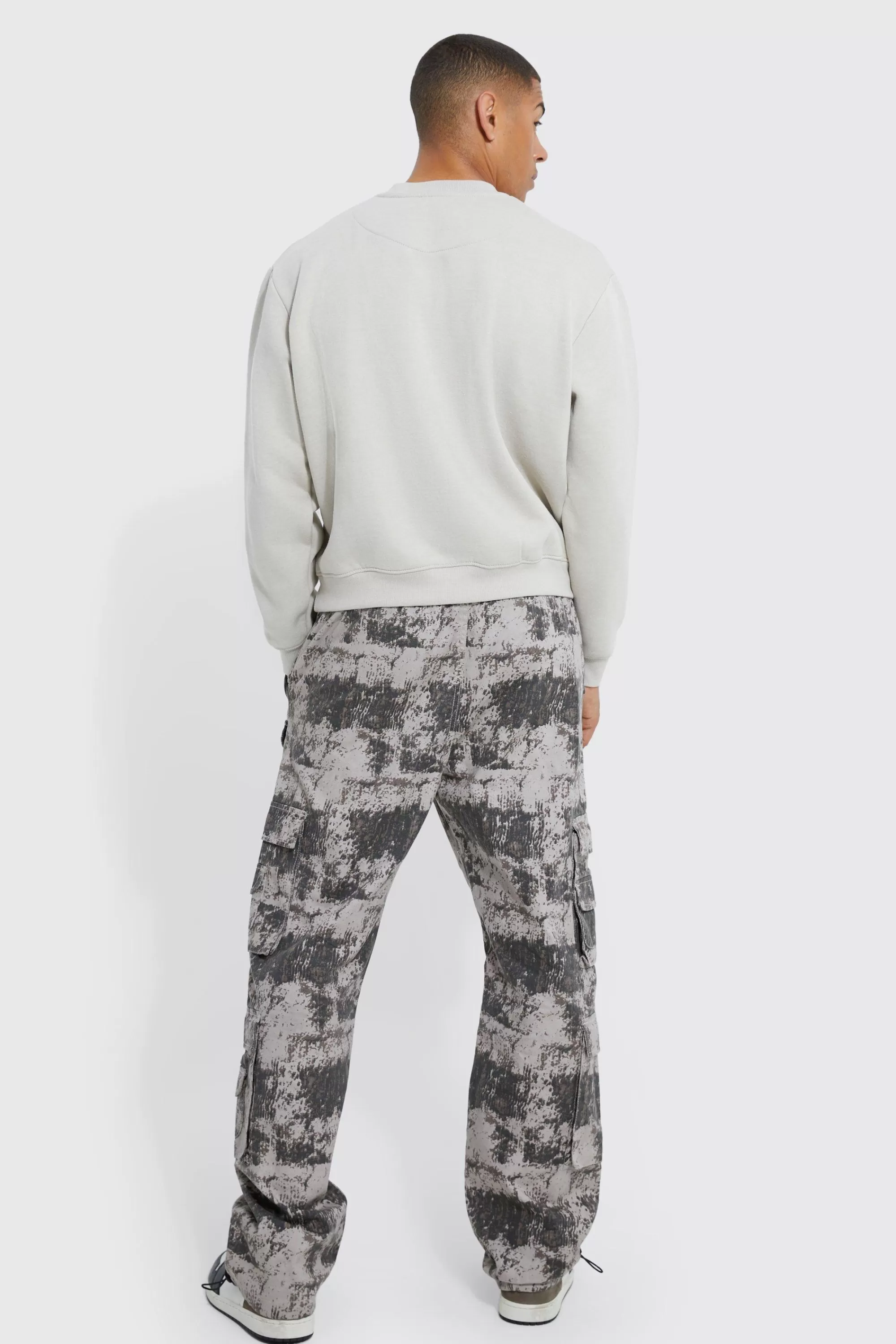 boohooMAN Elasticated Waist Printed Pocket Stacked Cargo Trousers | UK
