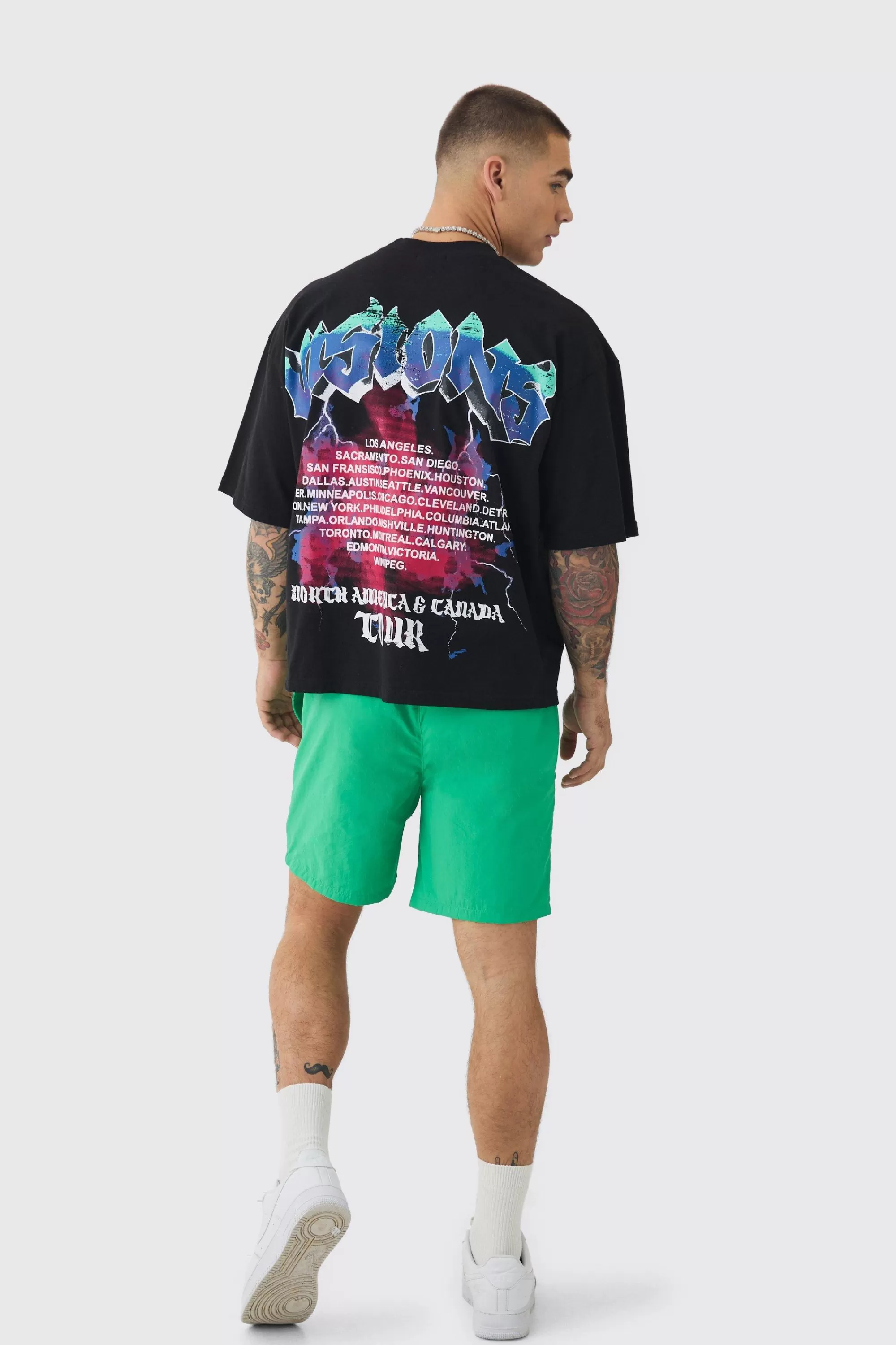 boohooMAN Elasticated Waist Relaxed Contrast Drawcord Shell Short Shorts | UK