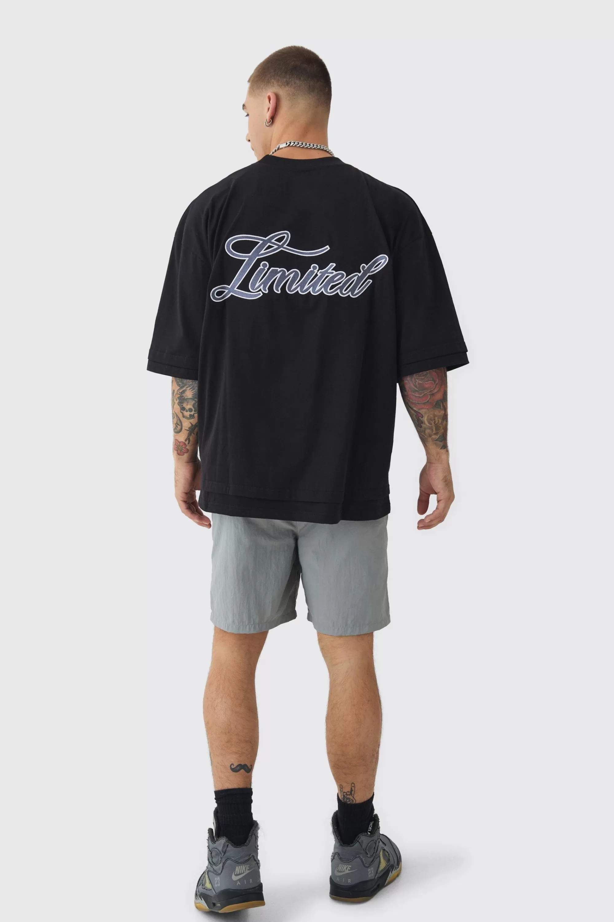 boohooMAN Elasticated Waist Relaxed Side Piping Shell Short Shorts In | UK