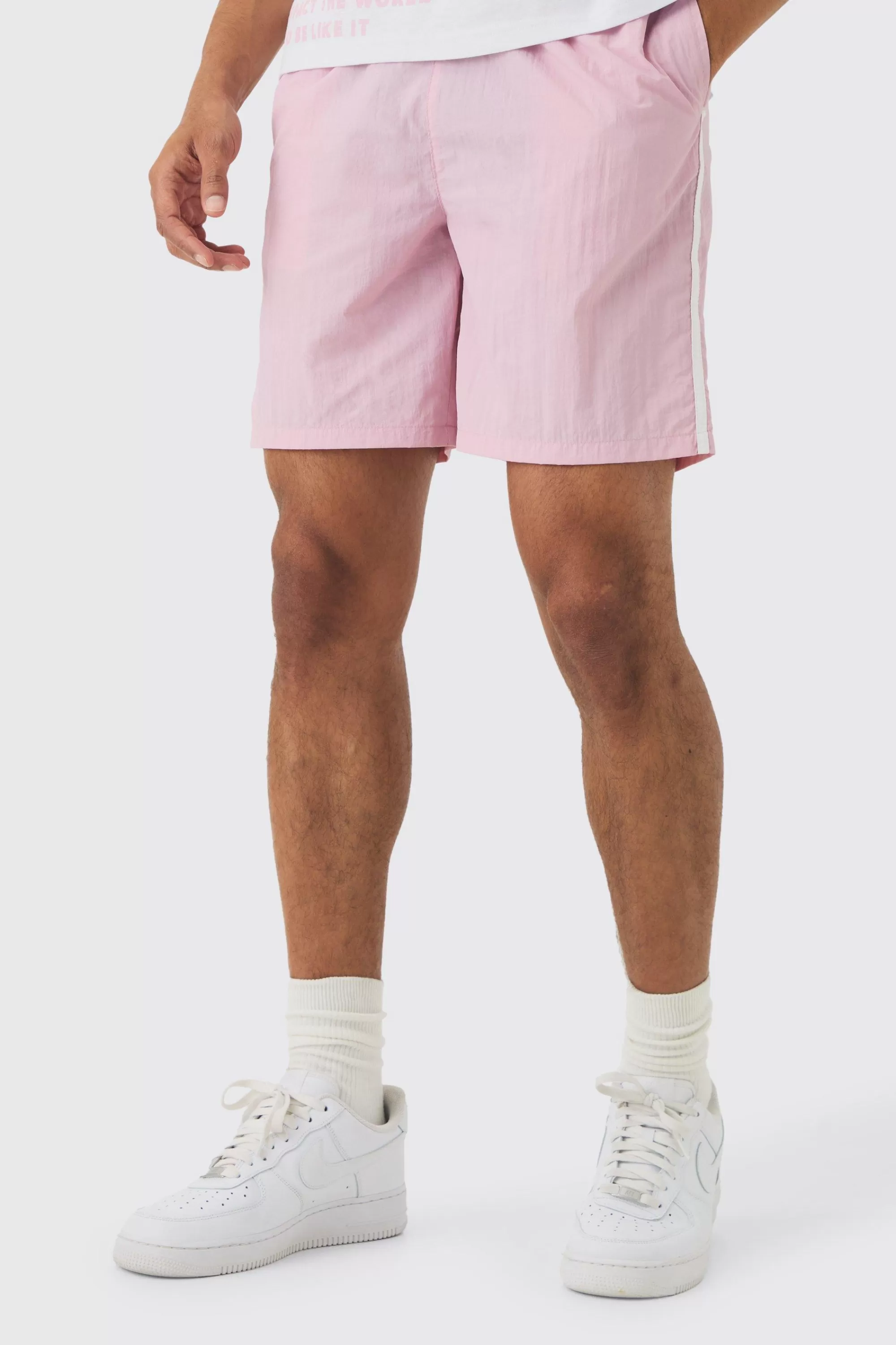 boohooMAN Elasticated Waist Relaxed Side Piping Shell Short Shorts In | UK