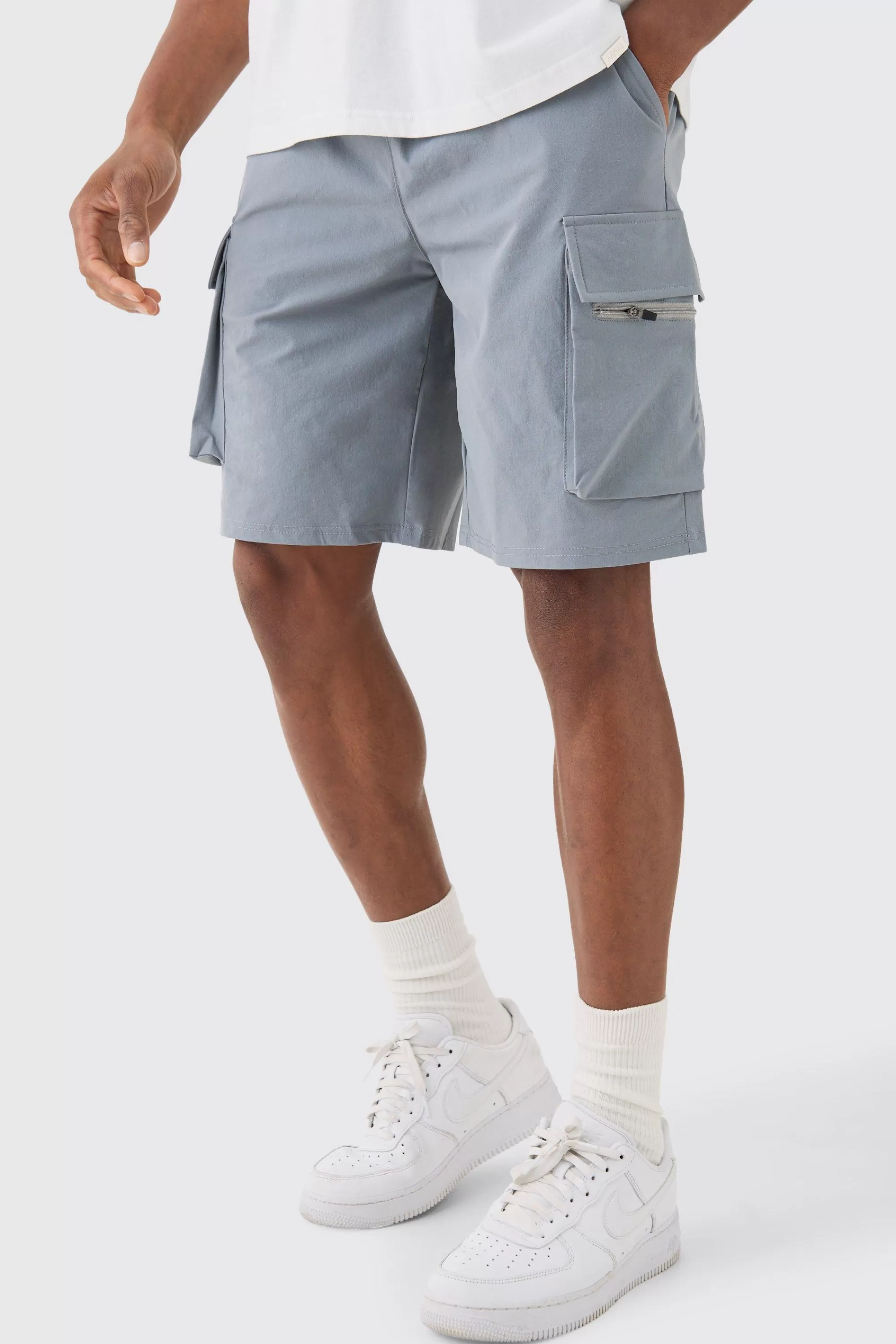 boohooMAN Elasticated Waist Relaxed Technical Stretch Cargo Short | UK