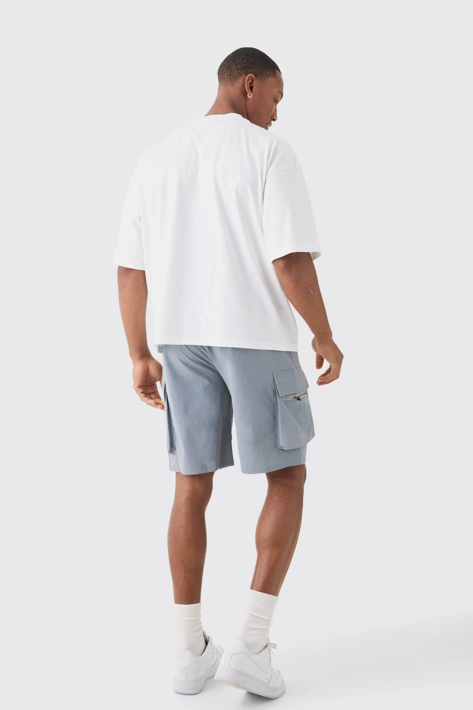 boohooMAN Elasticated Waist Relaxed Technical Stretch Cargo Short | UK