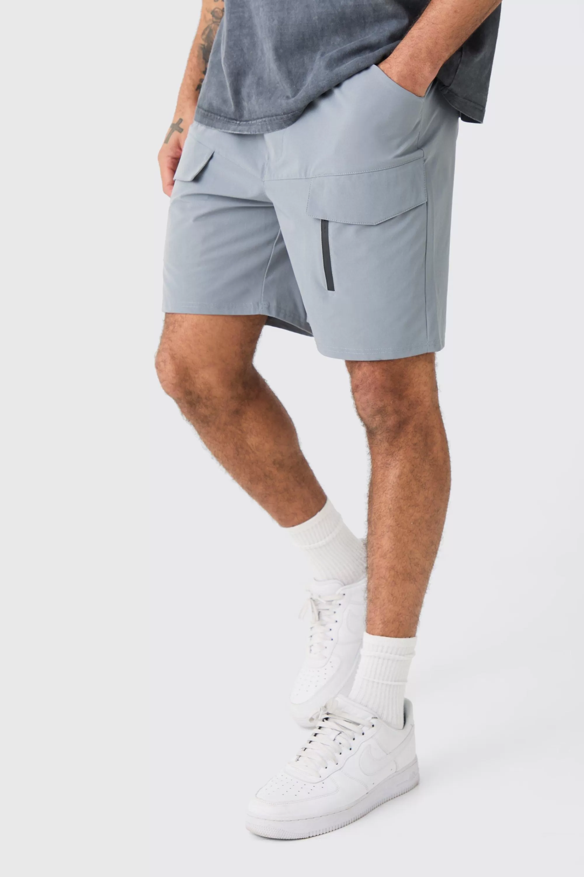 boohooMAN Elasticated Waist Relaxed Technical Stretch Cargo With Zip | UK