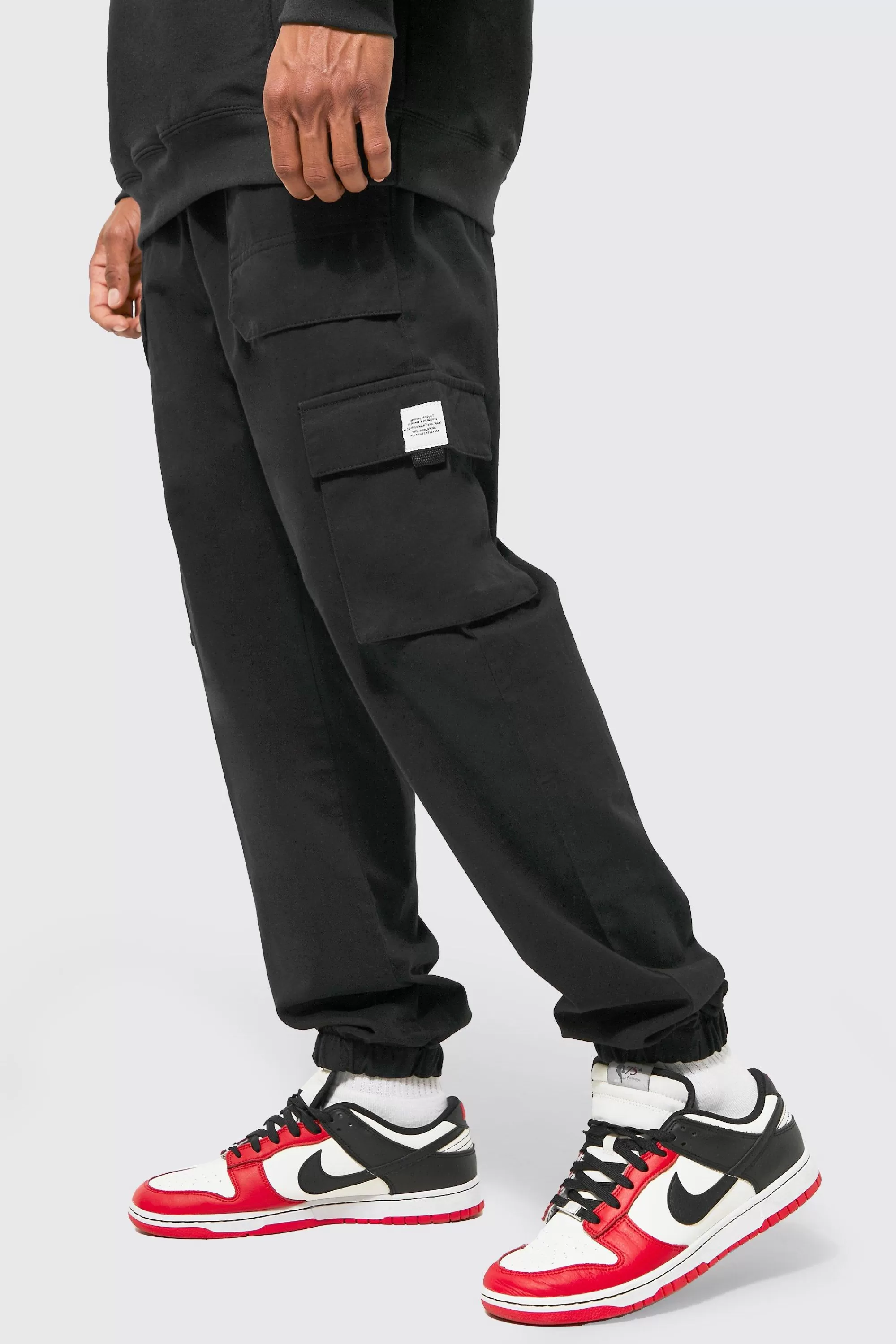 boohooMAN Elasticated Waist Slim Fit Buckle Cargo Trouser | UK