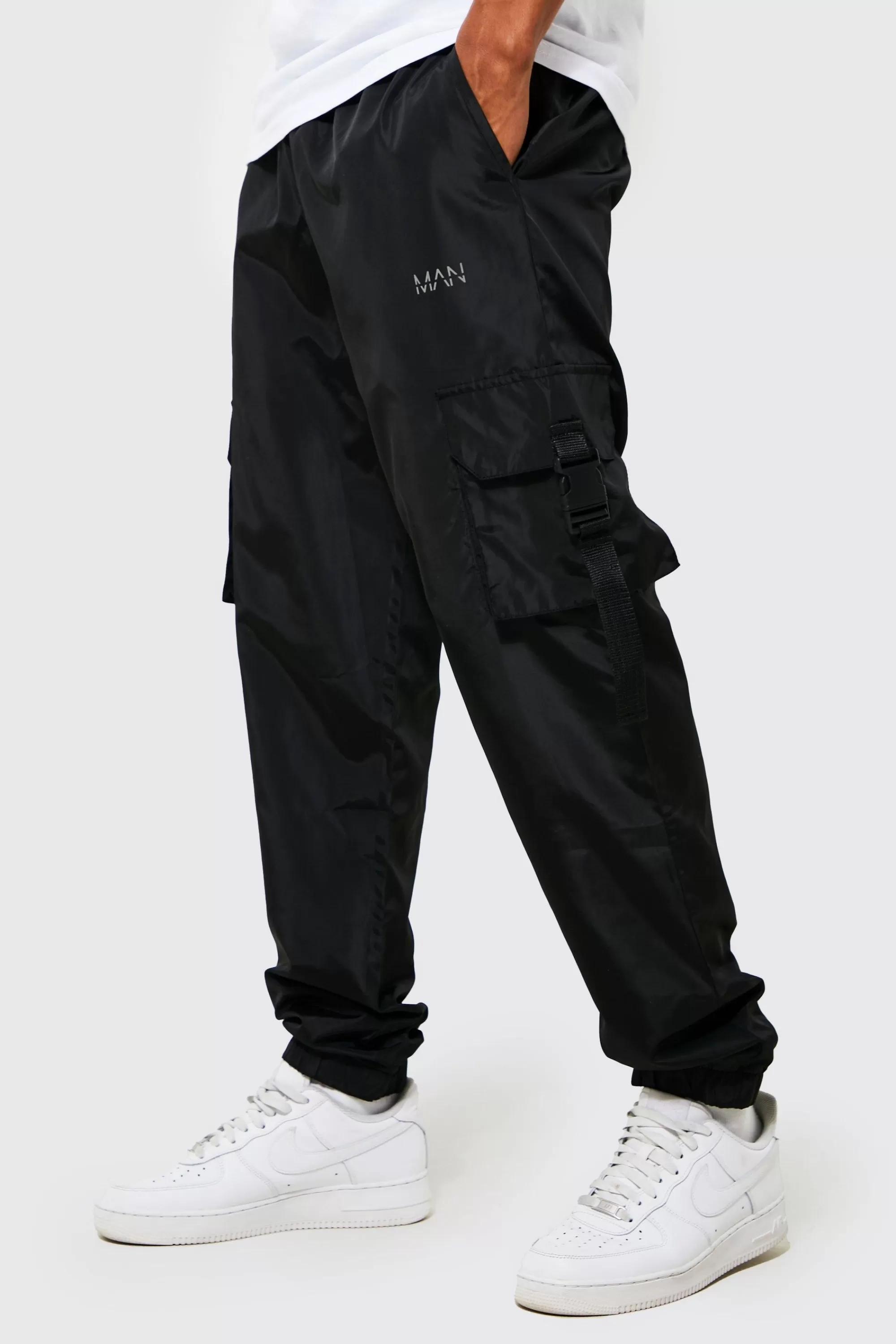 boohooMAN Elasticated Waist Slim Fit Man Shell Cargo Jogger | UK