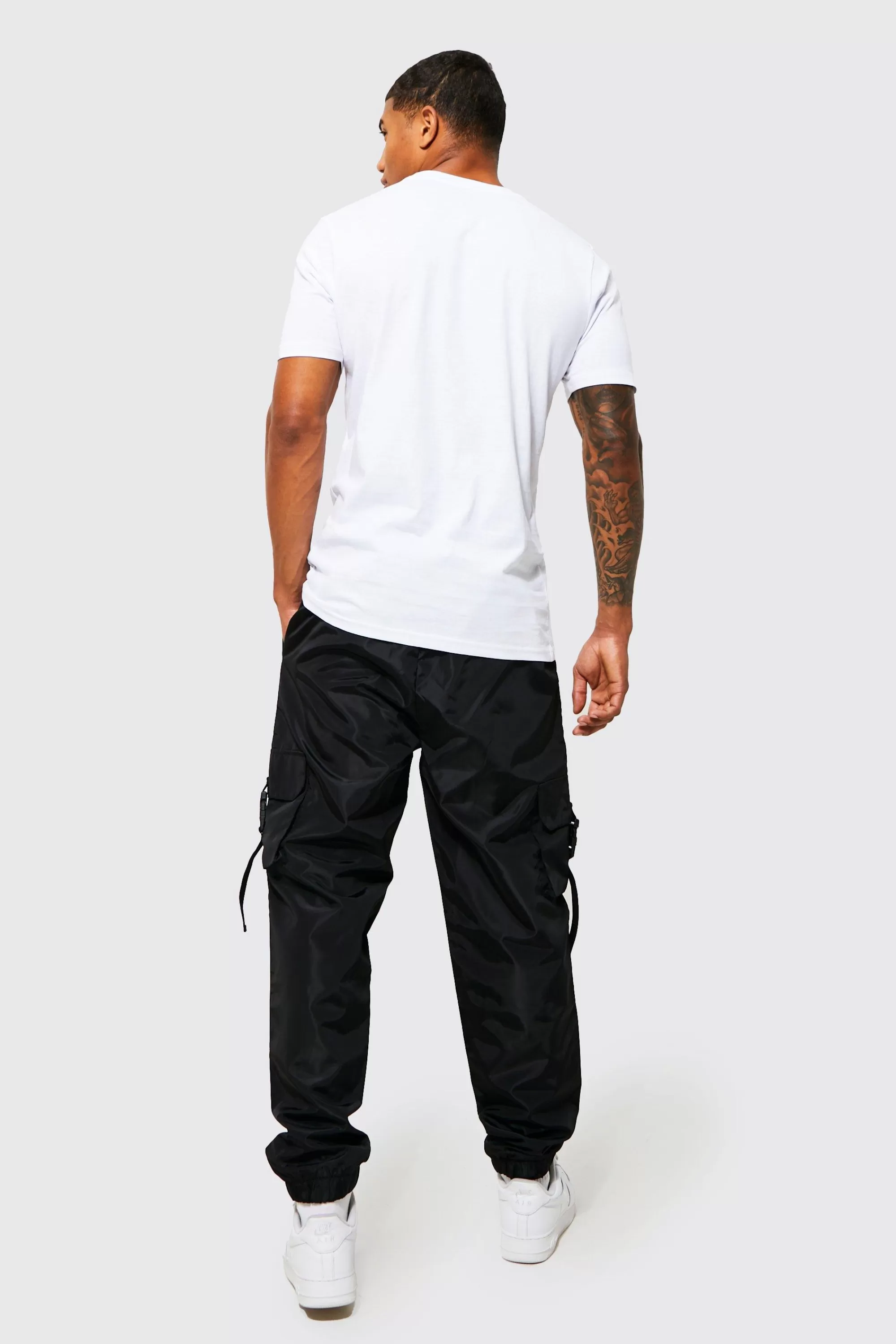 boohooMAN Elasticated Waist Slim Fit Man Shell Cargo Jogger | UK
