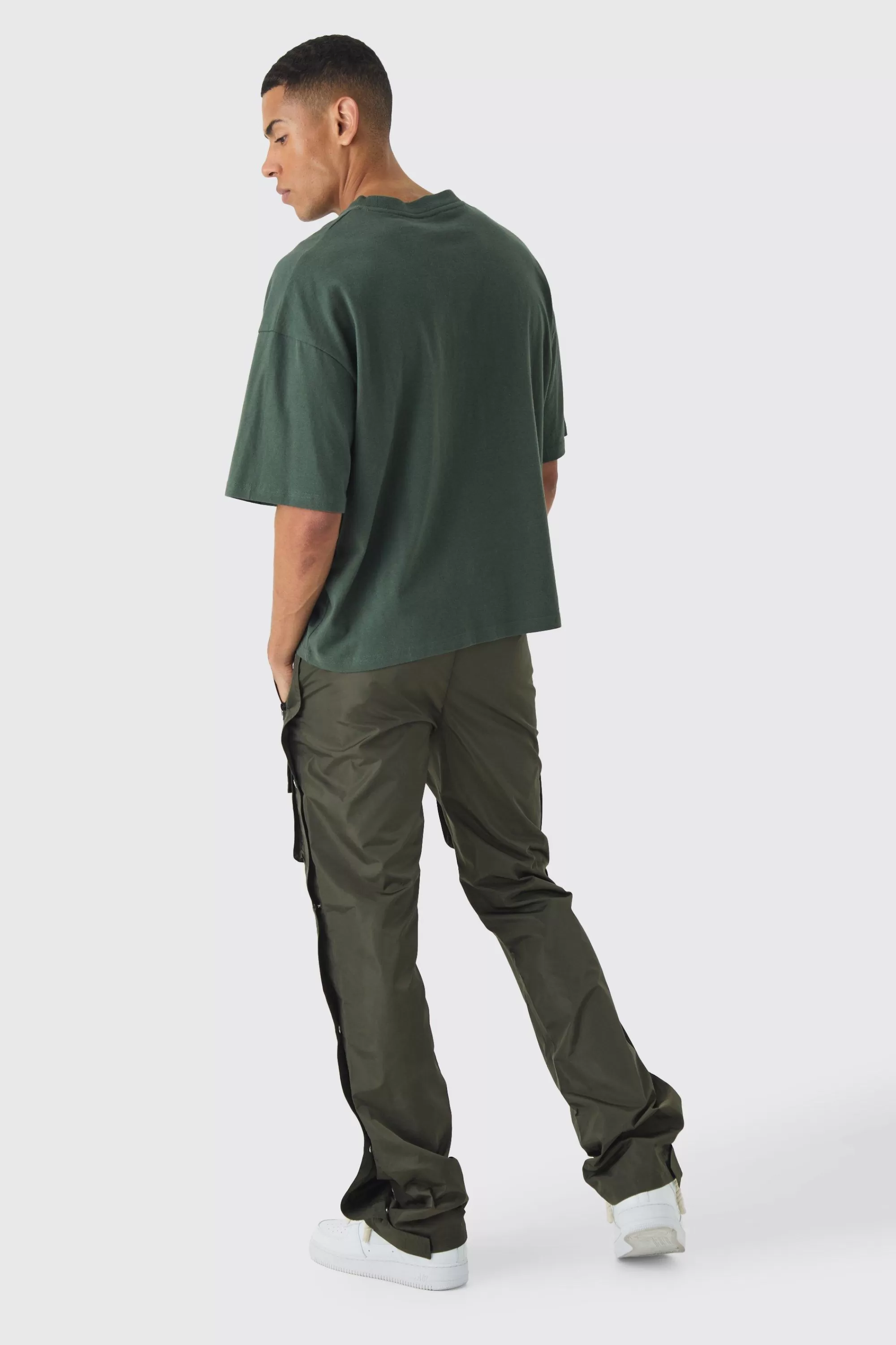 boohooMAN Elasticated Waist Slim Flare Stacked Cargo Trousers | UK