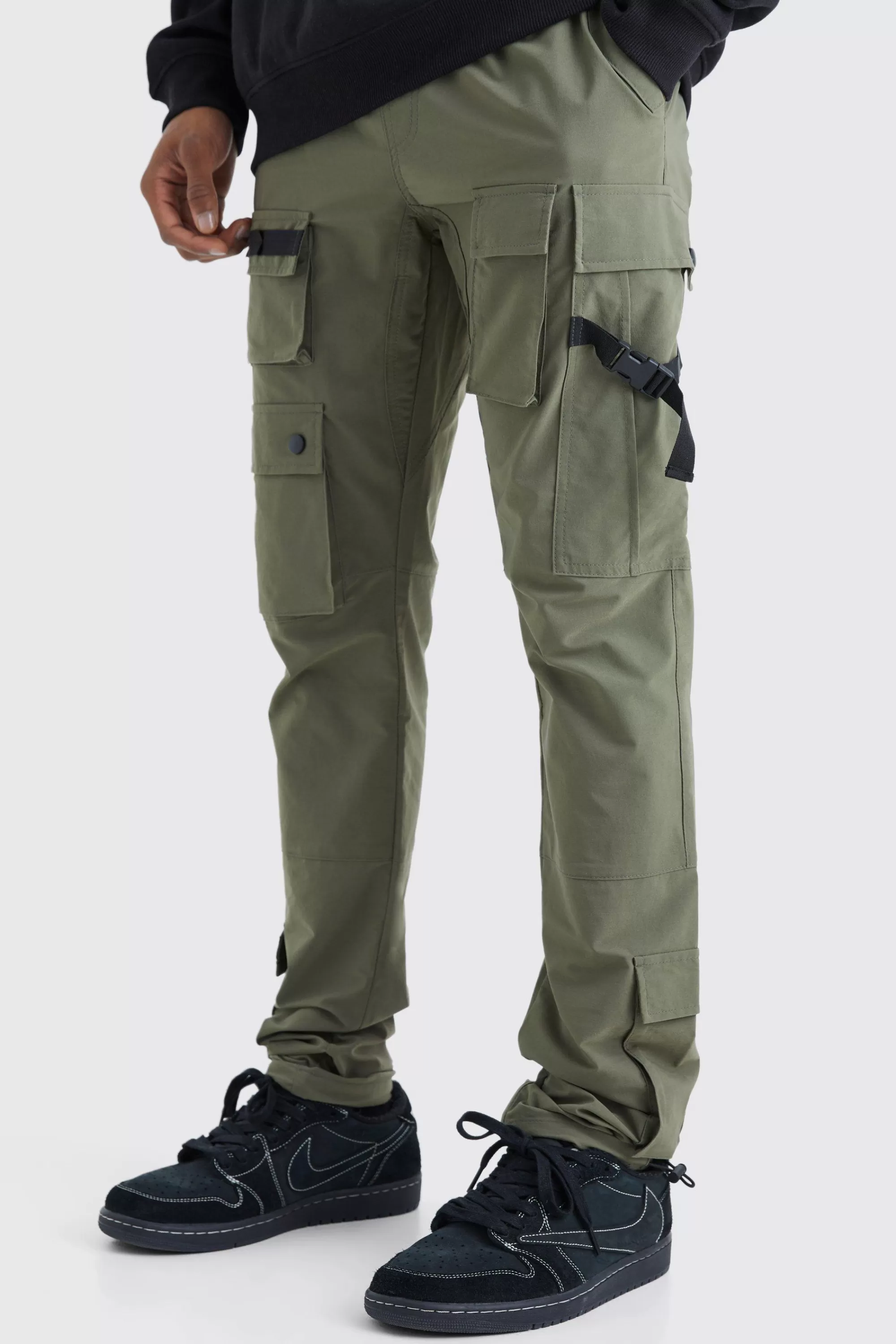 boohooMAN Elasticated Waist Slim Multi Cargo Strap Trouser | UK