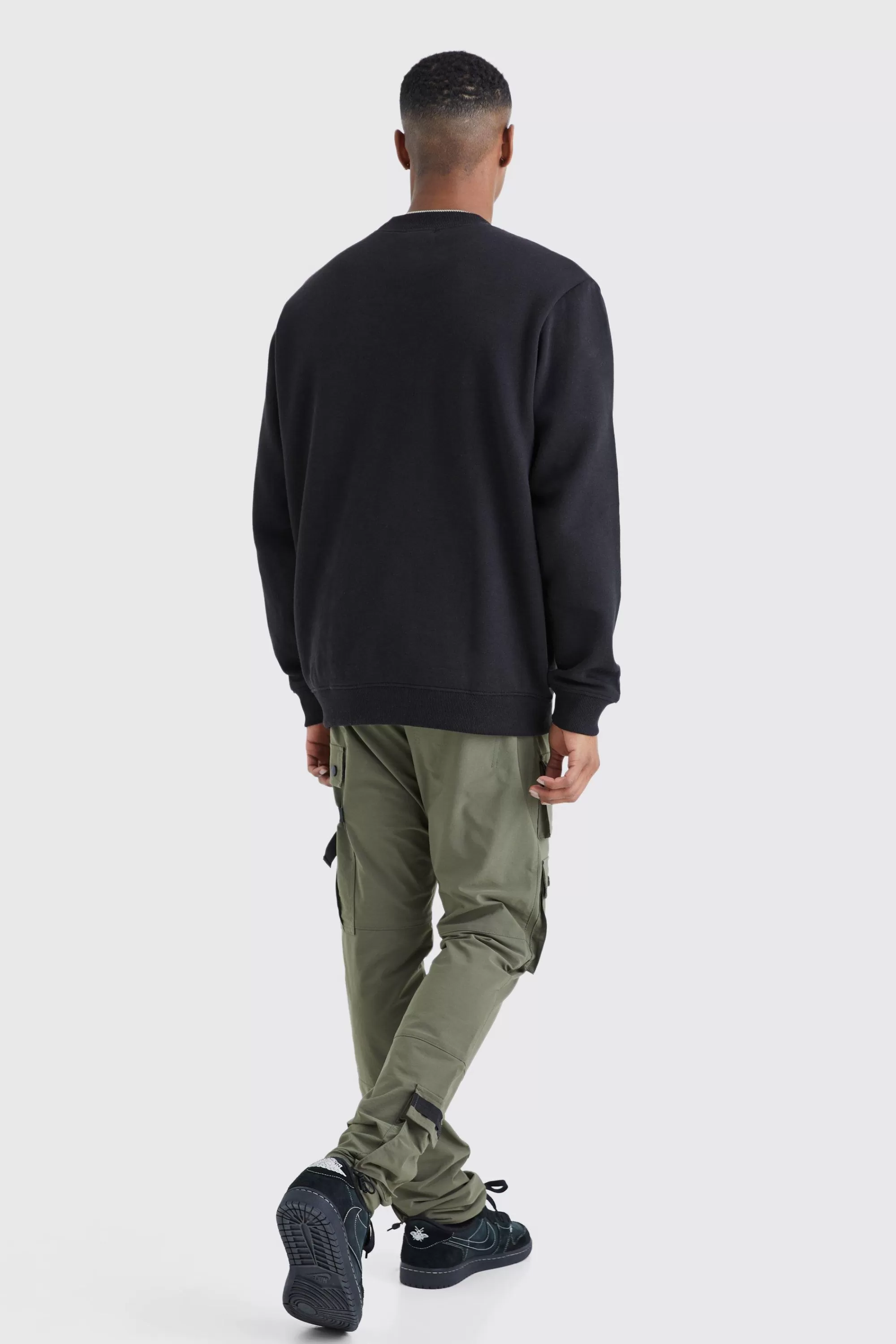 boohooMAN Elasticated Waist Slim Multi Cargo Strap Trouser | UK