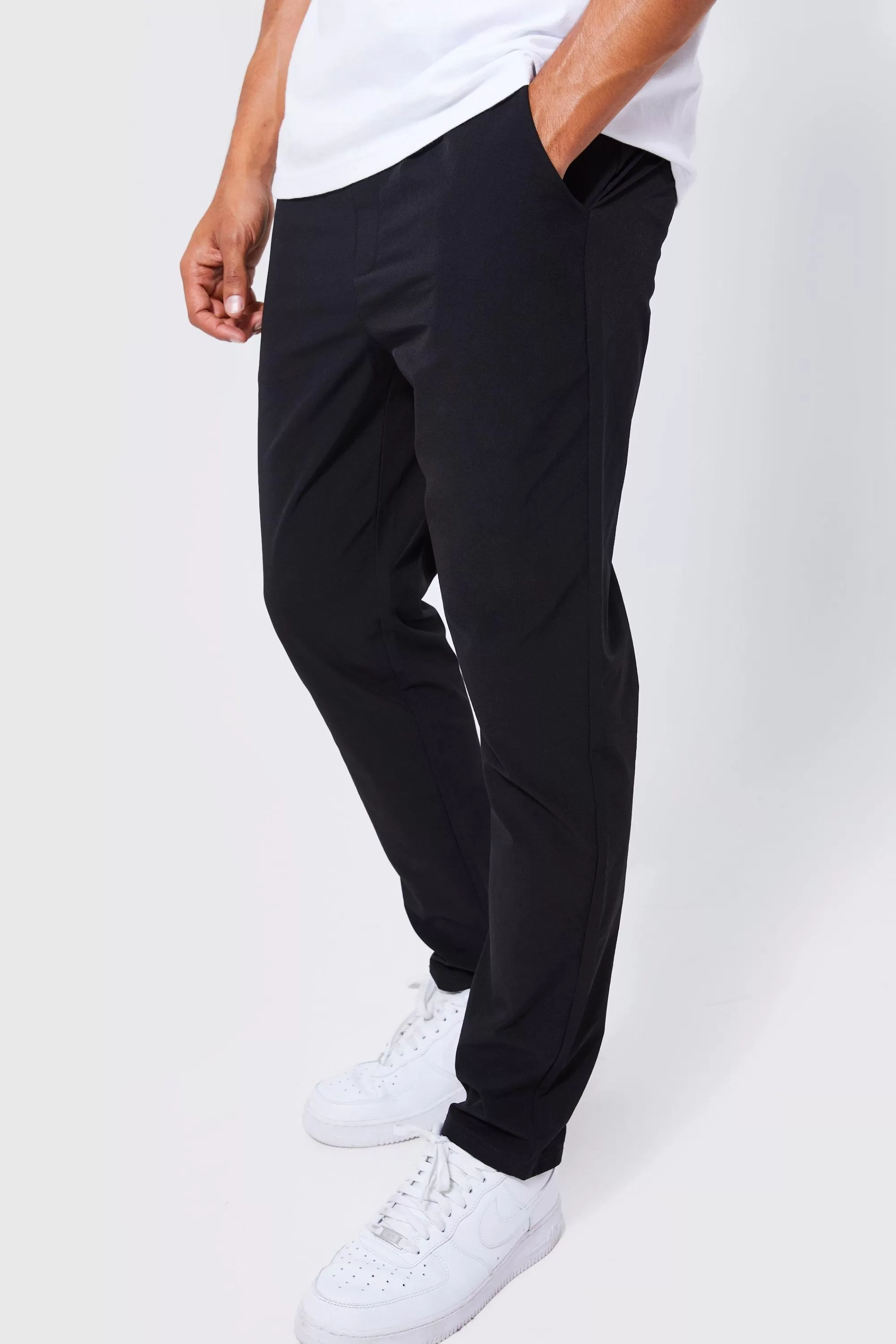 boohooMAN Elasticated Waist Technical Golf Stretch Slim Trouser | UK