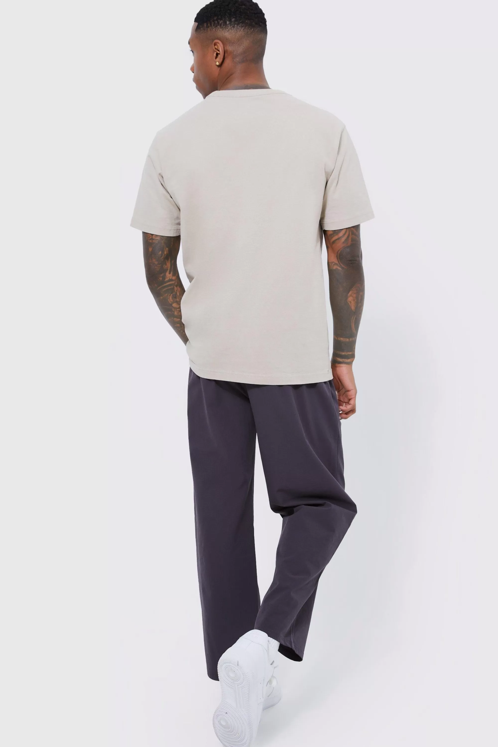 boohooMAN Elasticated Waist Technical Stretch Relaxed Cropped Trouser | UK