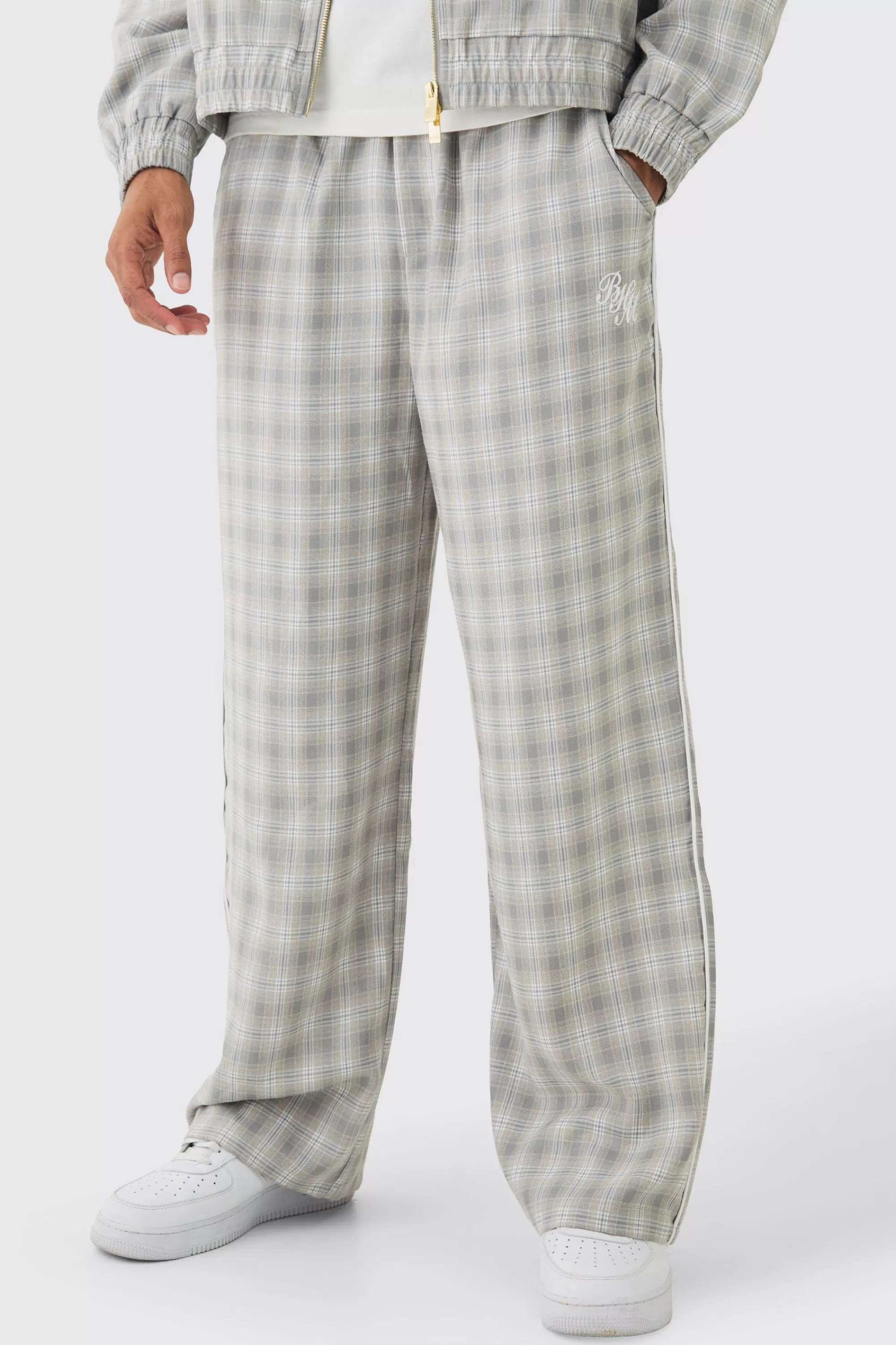 boohooMAN Elasticated Waist Wide Leg Checked Trousers | UK