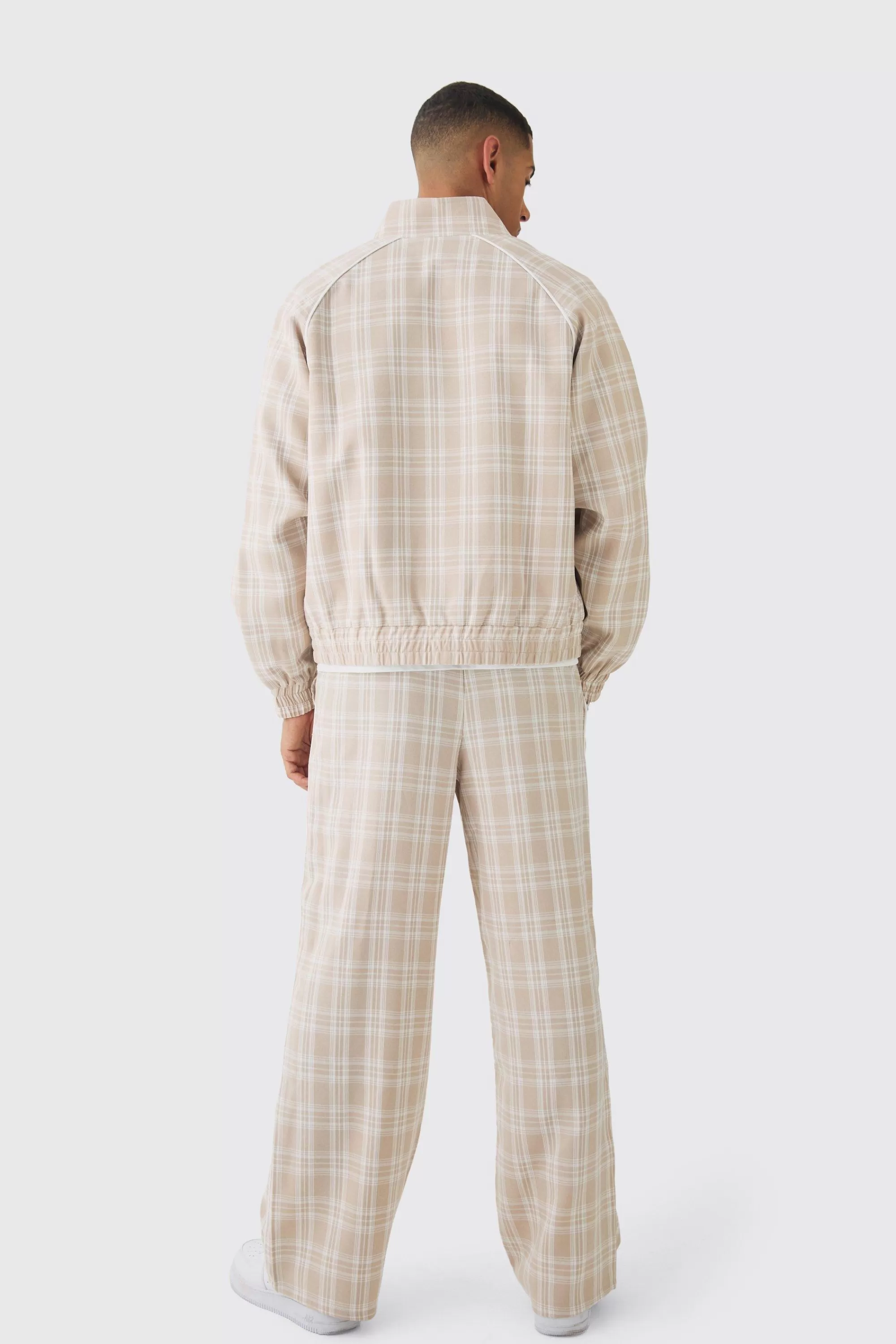 boohooMAN Elasticated Waist Wide Leg Checked Trousers | UK