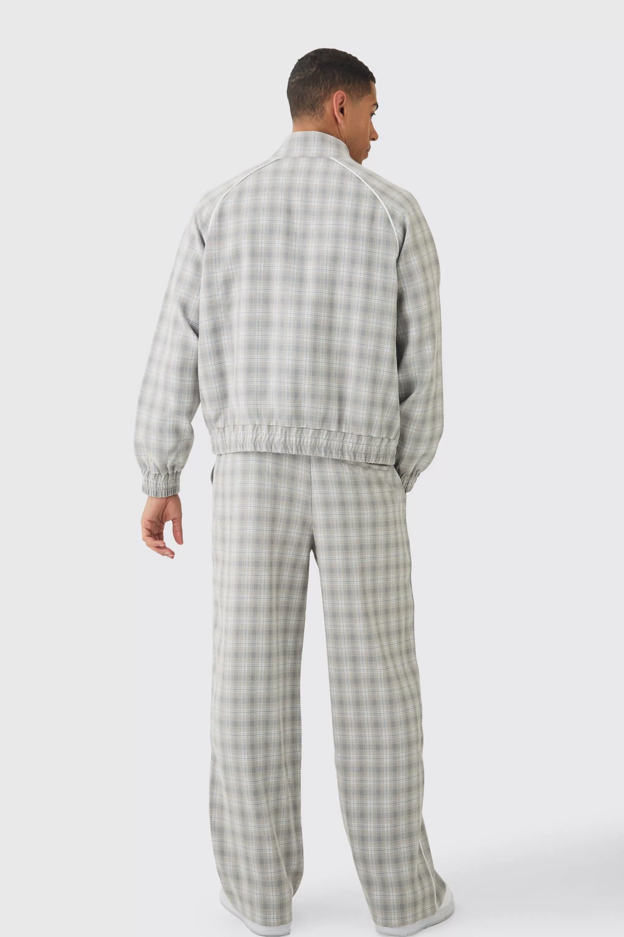 boohooMAN Elasticated Waist Wide Leg Checked Trousers | UK