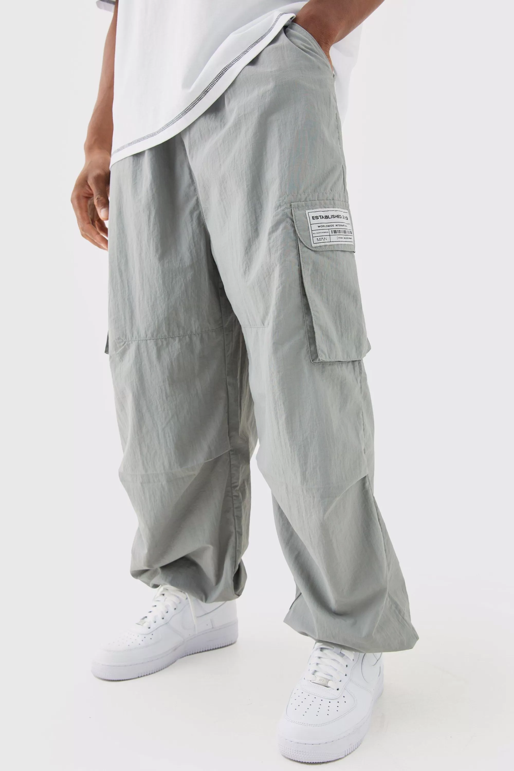boohooMAN Elasticated Waist Woven Tab Parachute Pants | UK