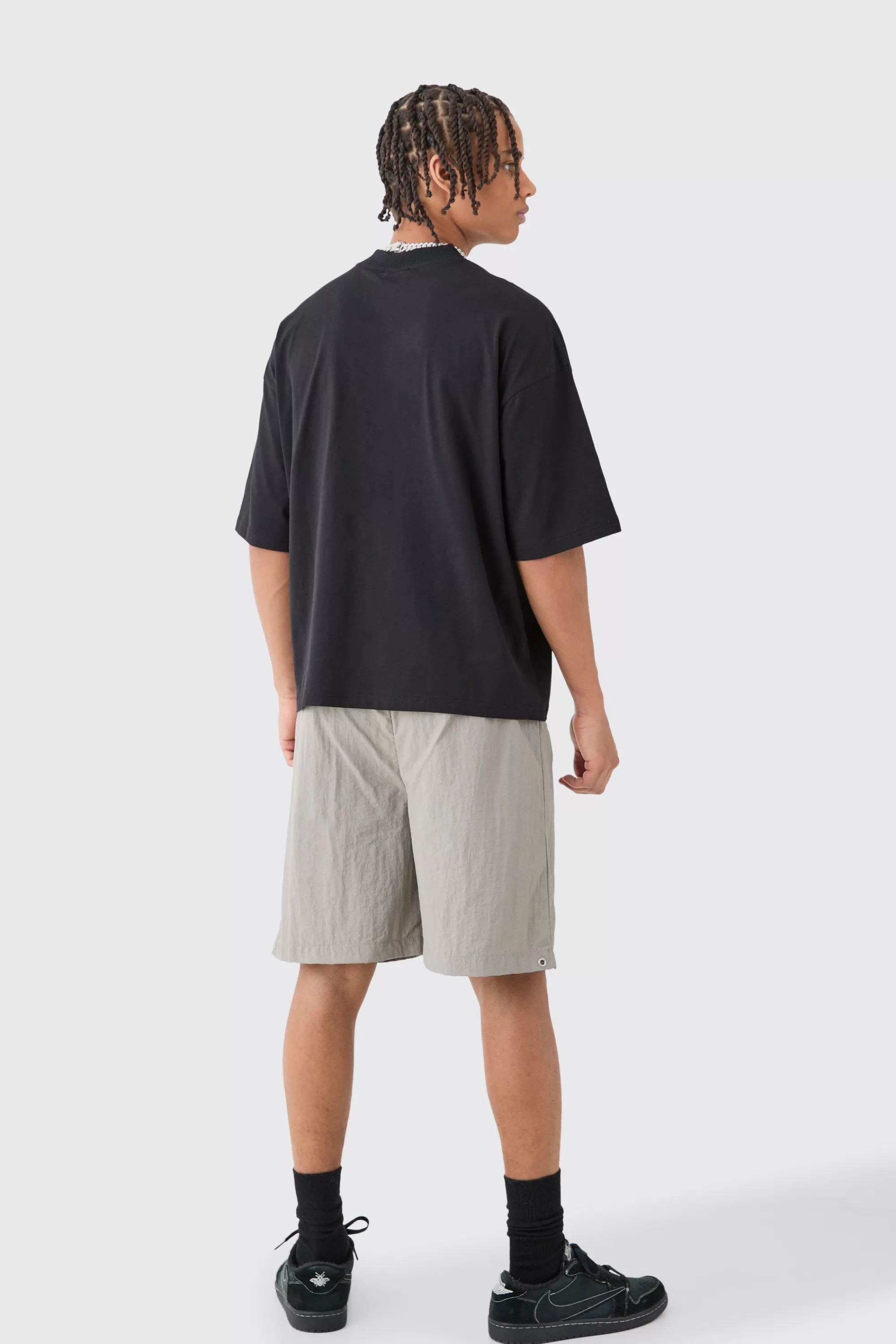 boohooMAN Elasticated Waist Zip Detail Relaxed Shell Short | UK