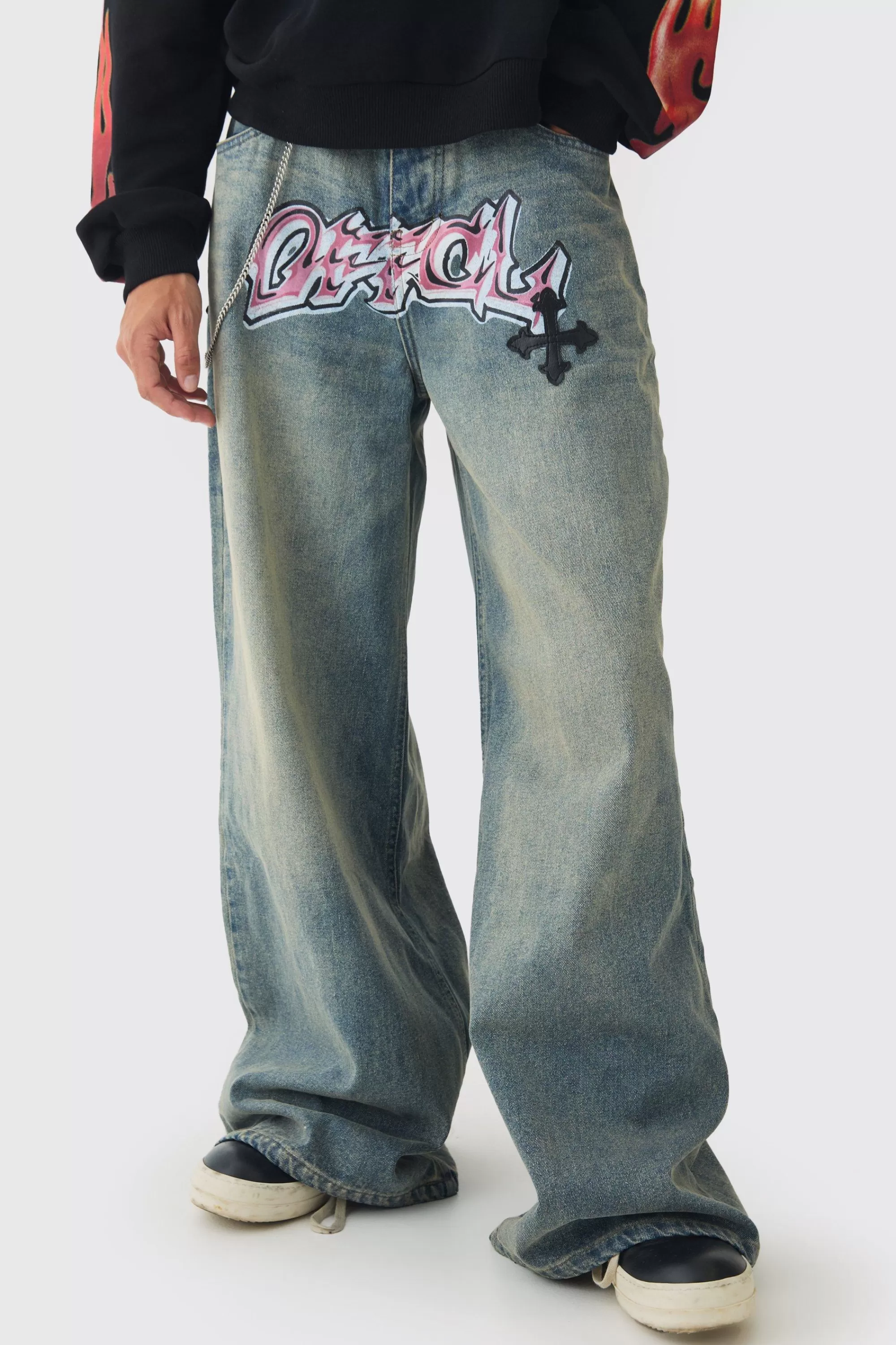boohooMAN Extreme Baggy Rigid Pu Cross Applique Washed Jeans | UK