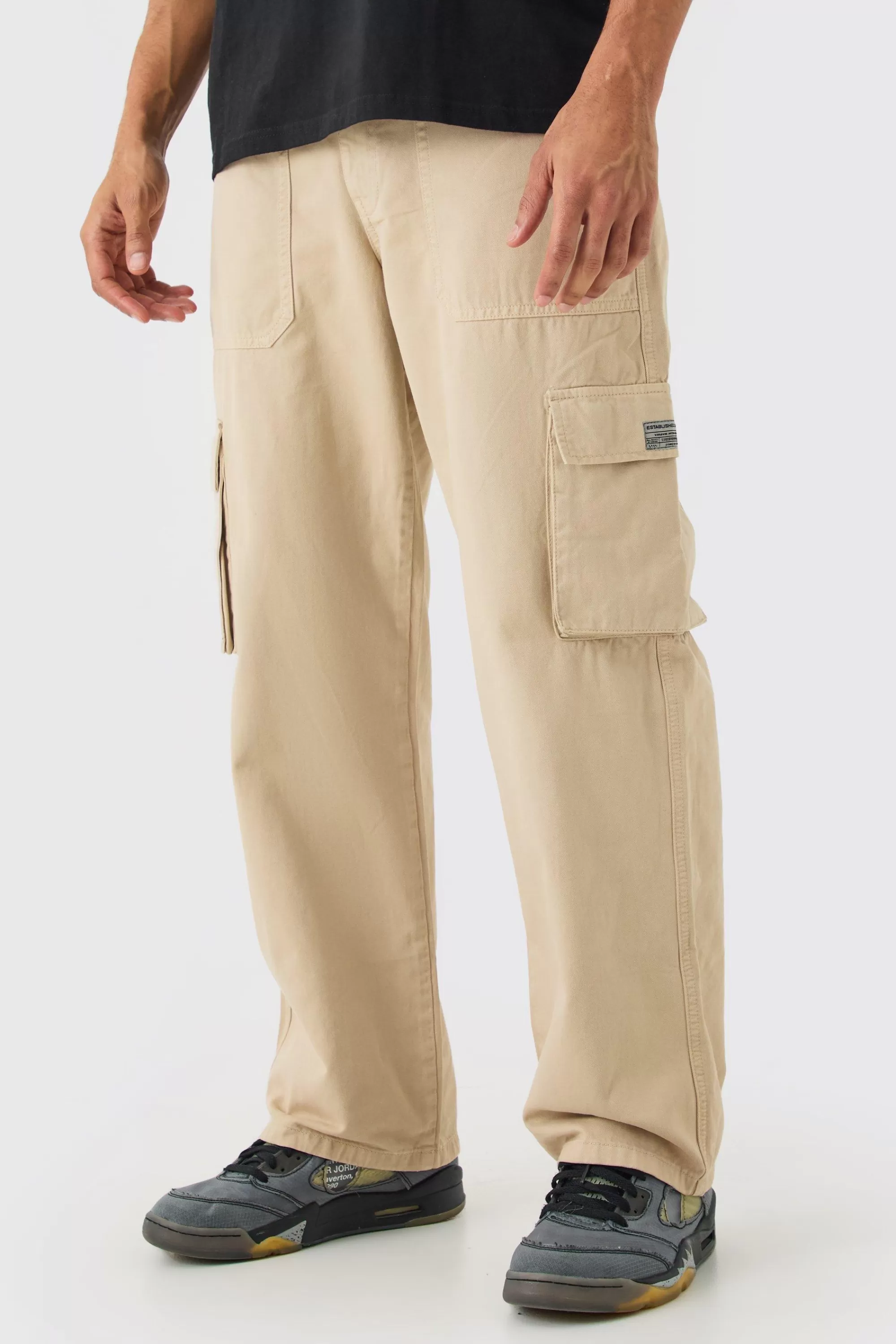 boohooMAN Fixed Waist Cargo Zip Trouser With Woven Tab | UK