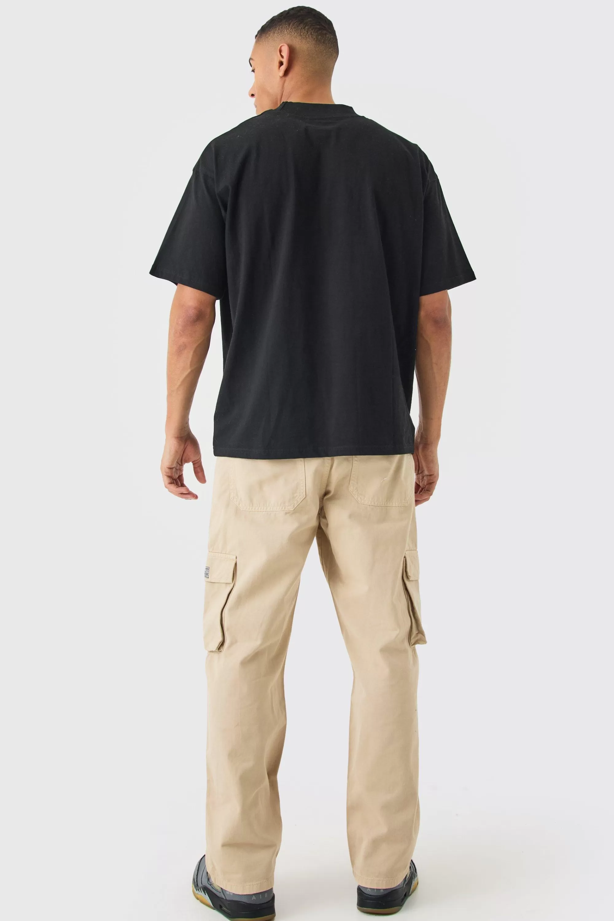 boohooMAN Fixed Waist Cargo Zip Trouser With Woven Tab | UK