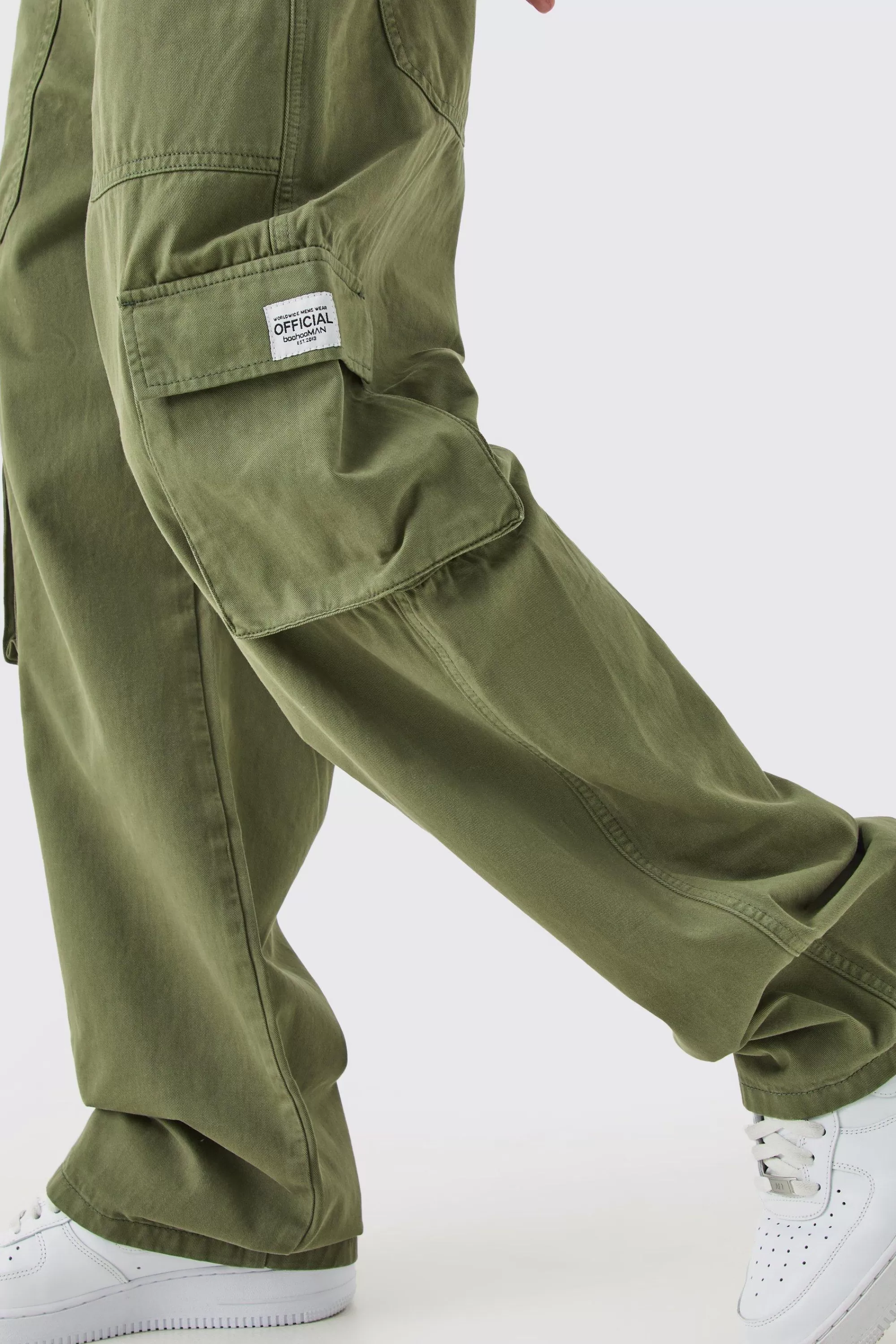 boohooMAN Fixed Waist Cargo Zip Trouser With Woven Tab | UK