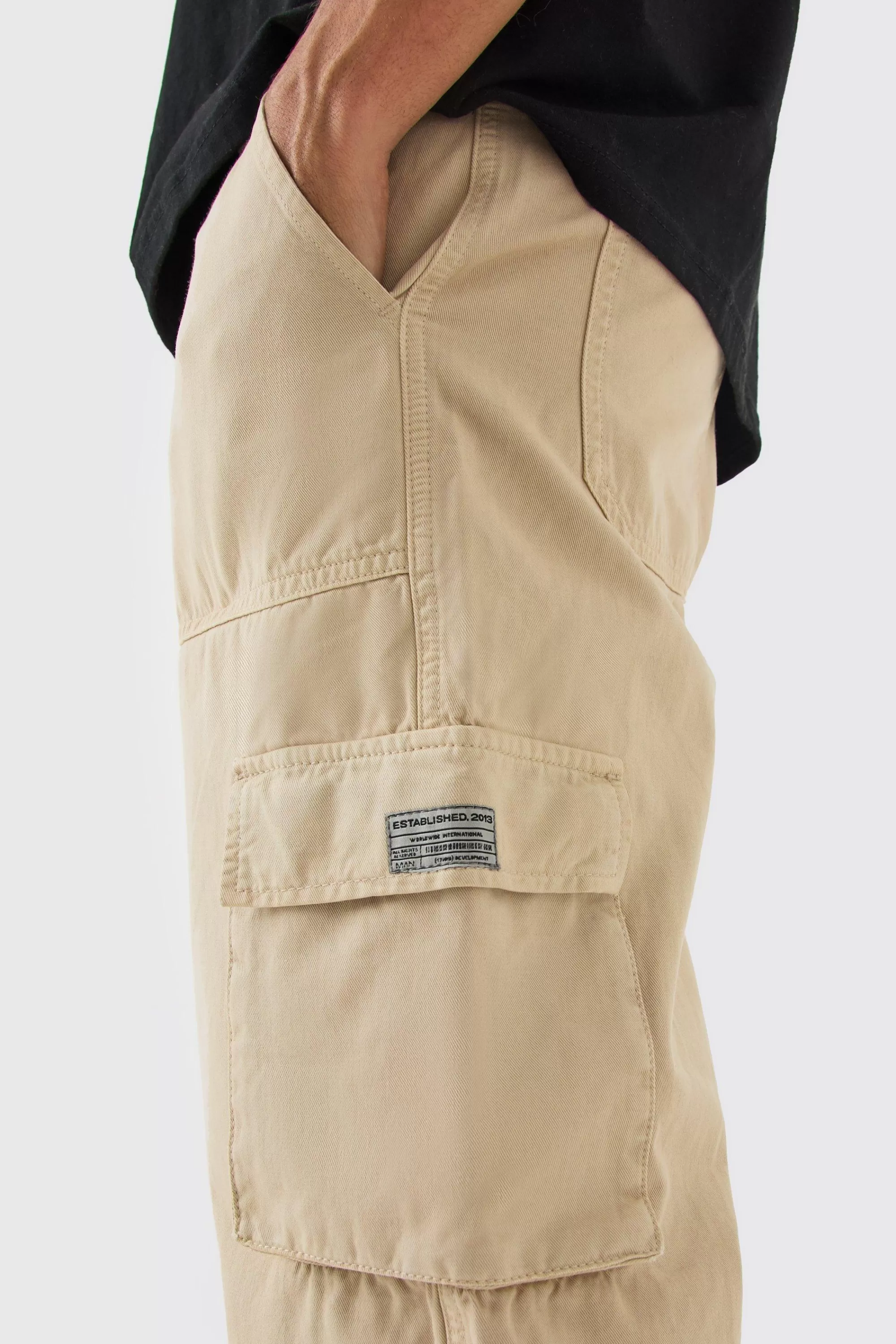 boohooMAN Fixed Waist Cargo Zip Trouser With Woven Tab | UK