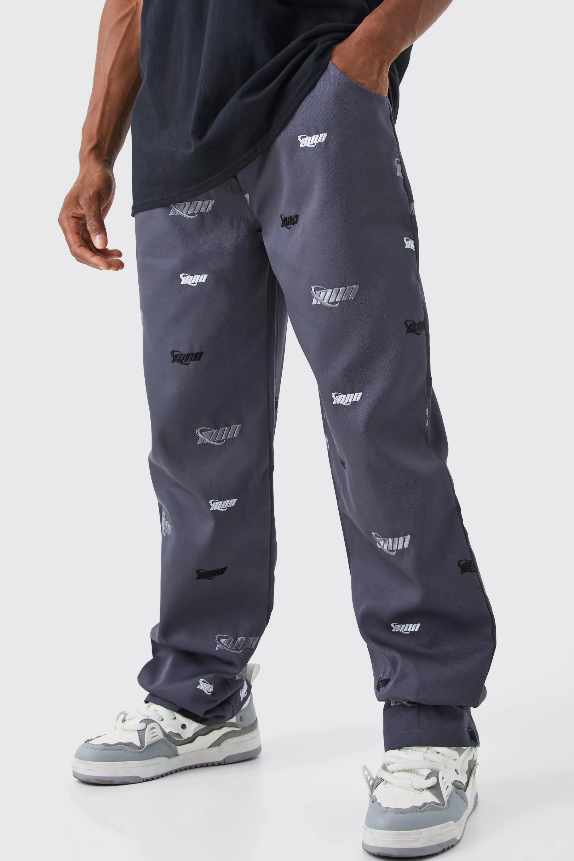 boohooMAN Fixed Waist Relaxed All Over Embroidery Trouser | UK