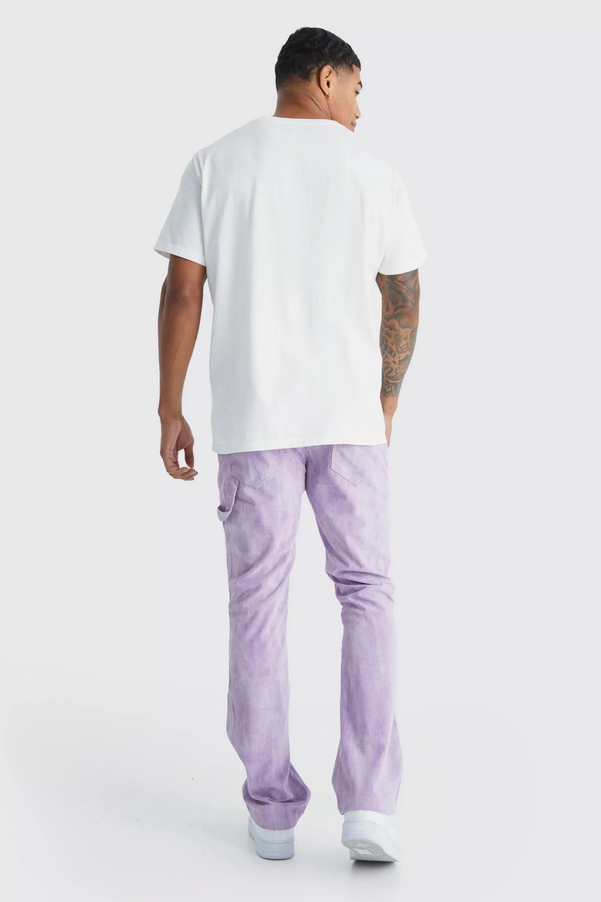 boohooMAN Fixed Waist Slim Flare Tie Dye Corduroy Trouser | UK