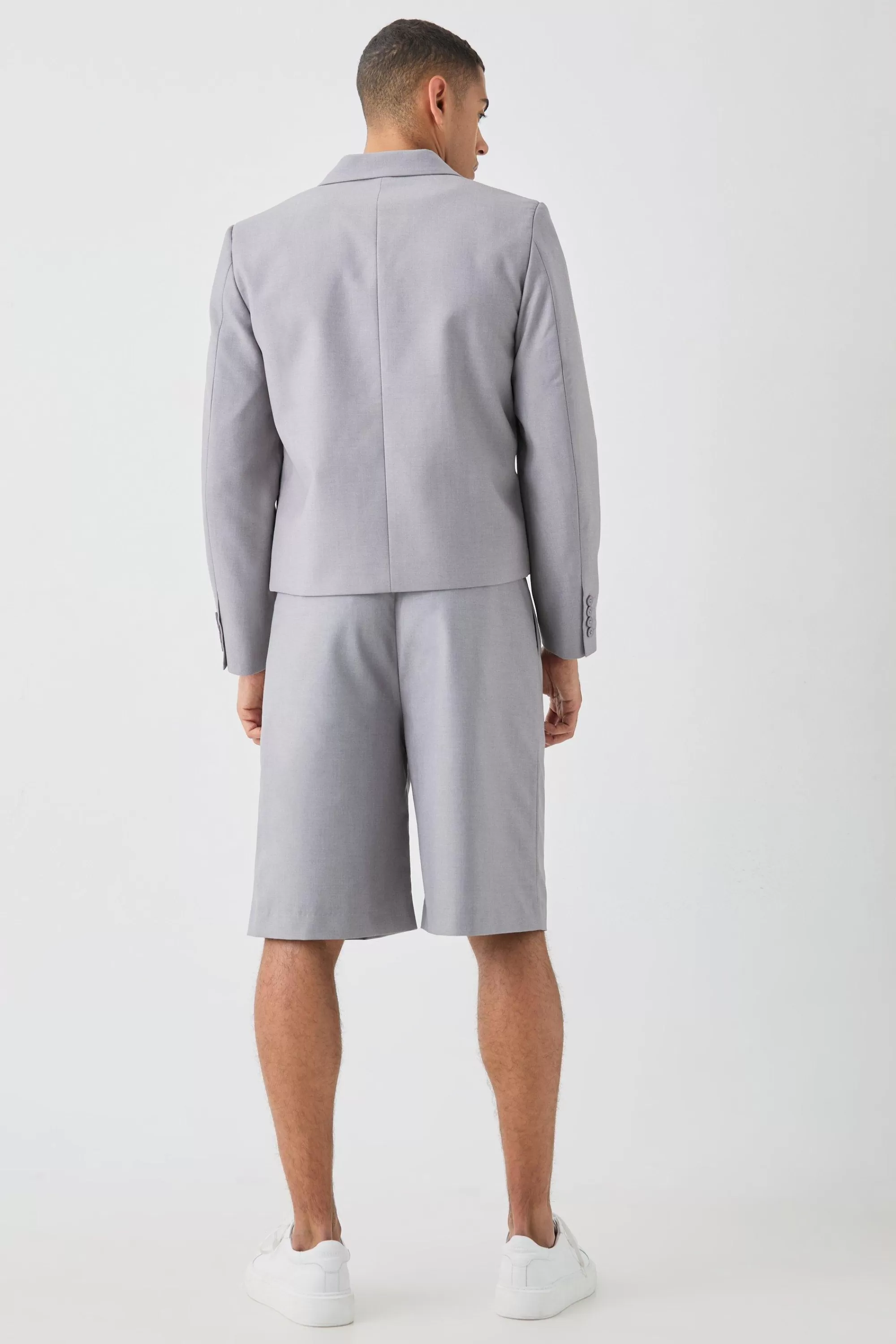 boohooMAN Fixed Waistband Tailored Pleated Jorts In | UK