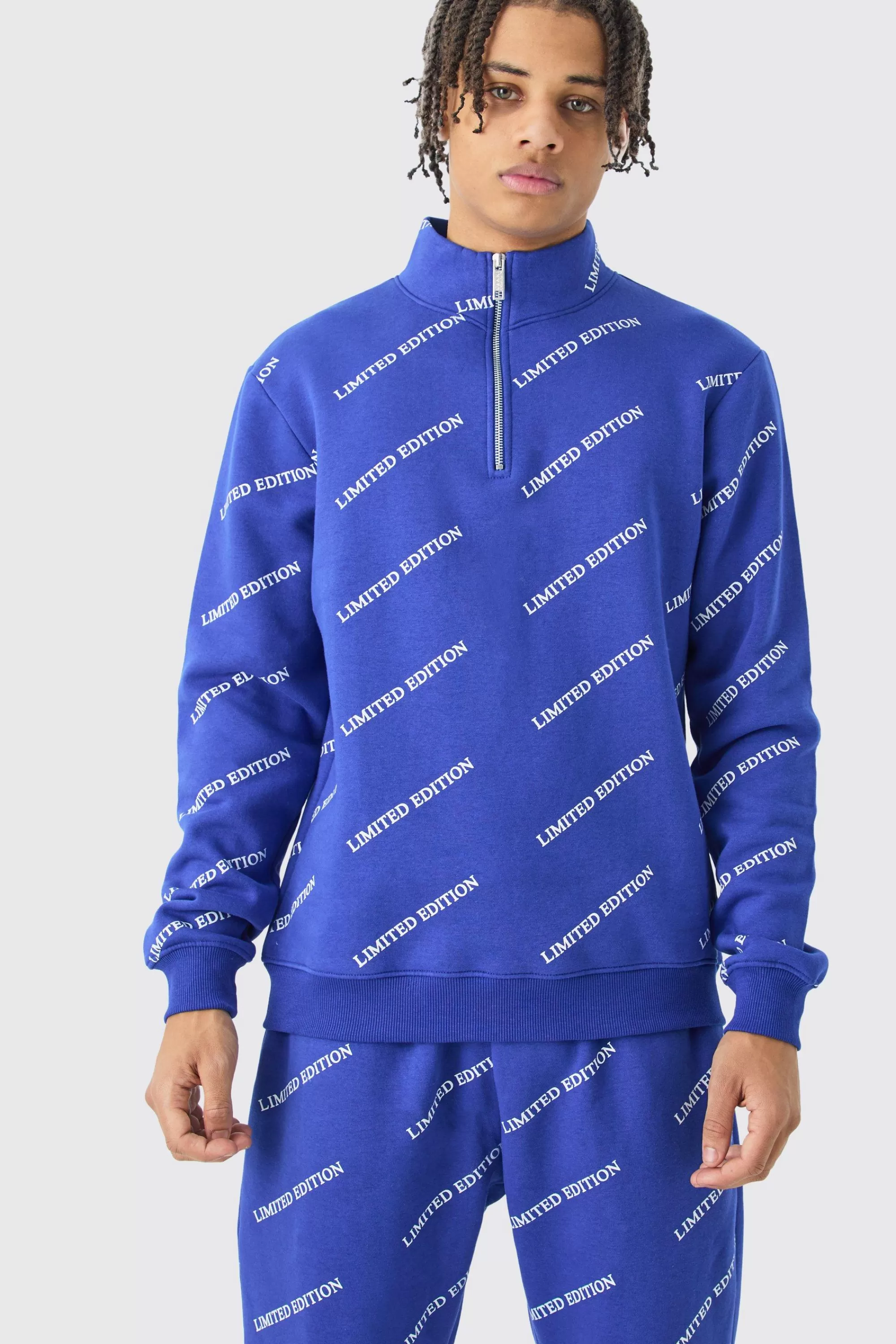 boohooMAN Limited Edition All Over Print Slim Quarter Zip Tracksuit | UK
