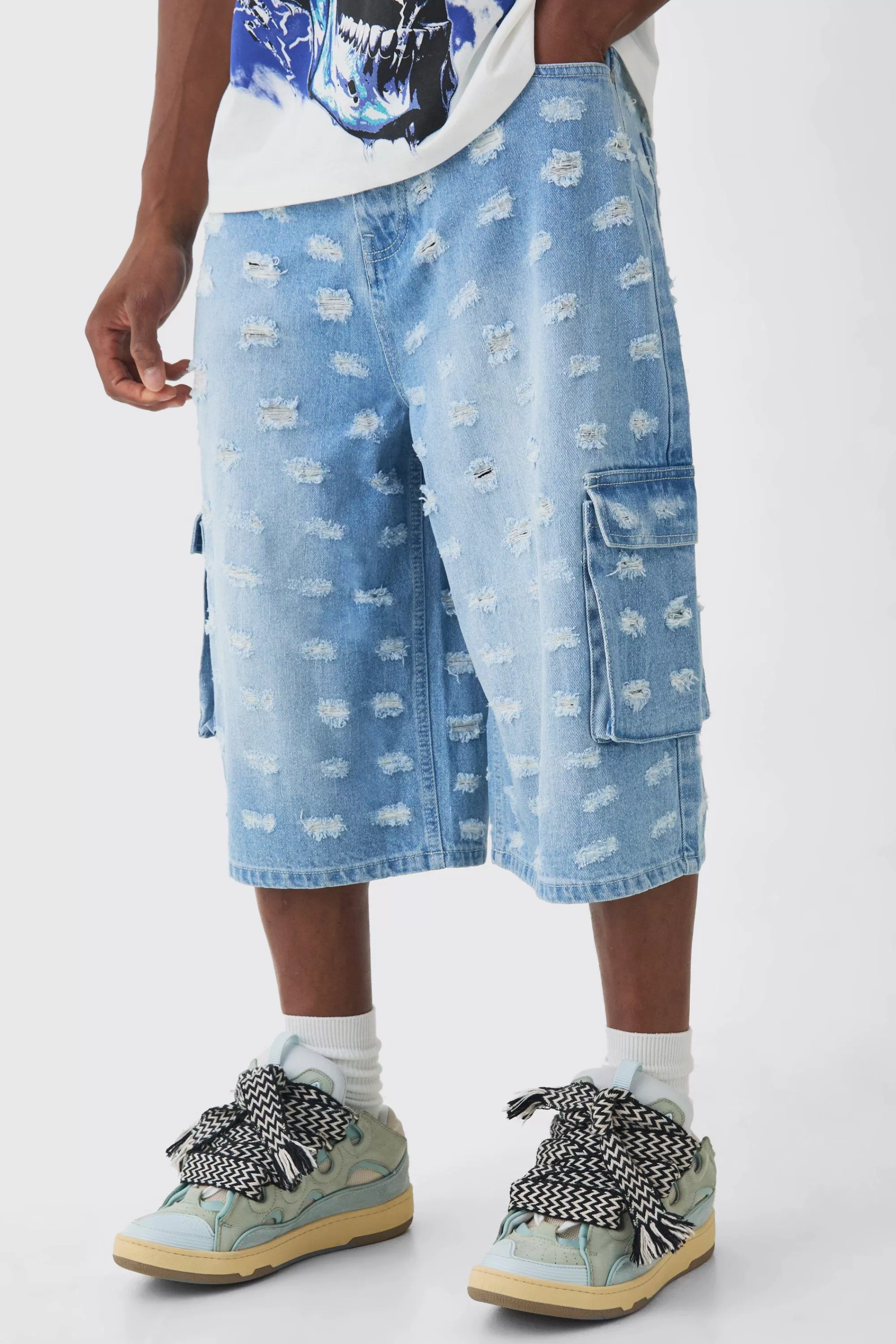 boohooMAN Longline All Over Distressed Cargo Denim Jorts In | UK
