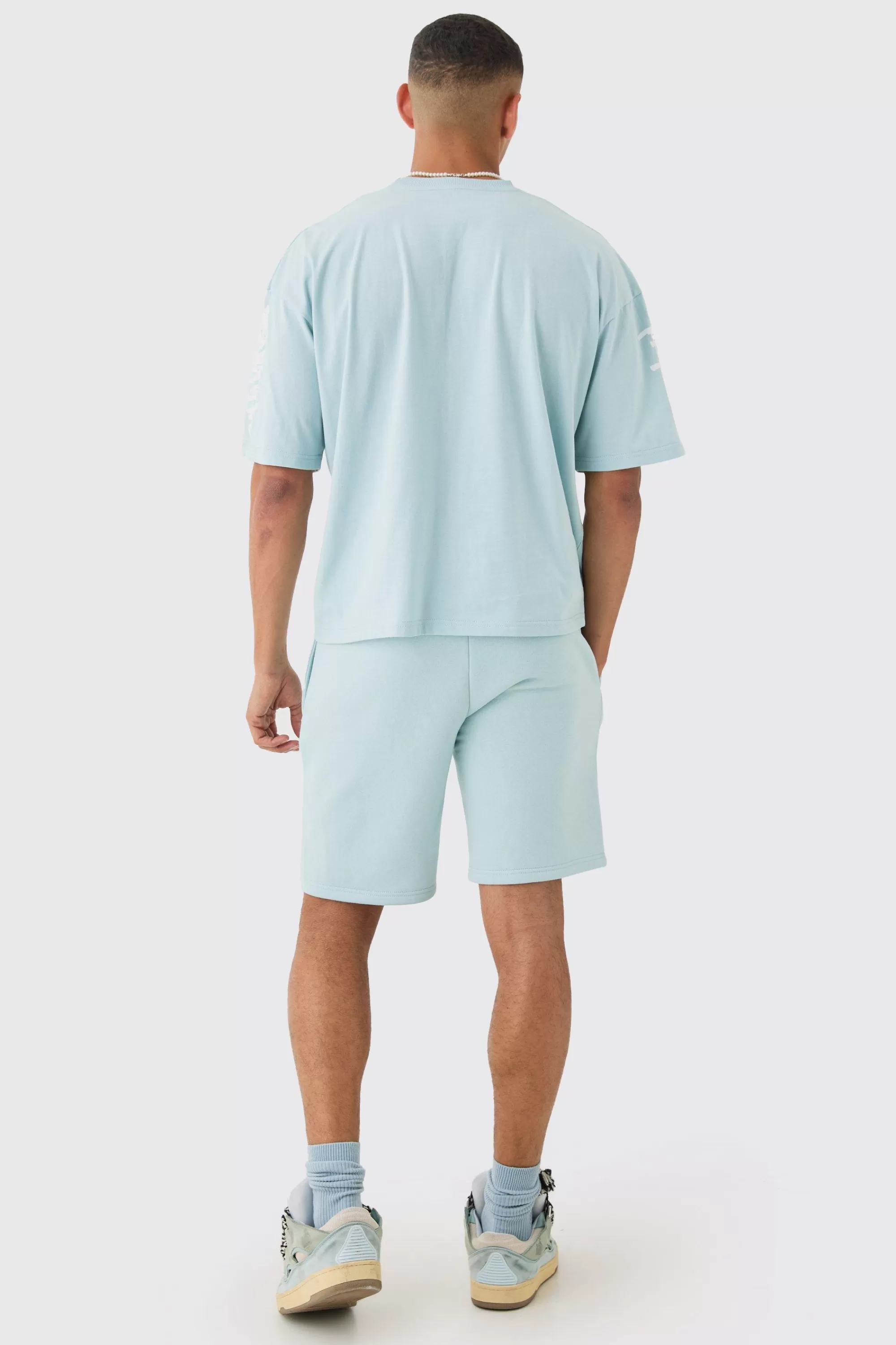 boohooMAN Loose Fit Graffiti Printed Jersey Shorts | UK
