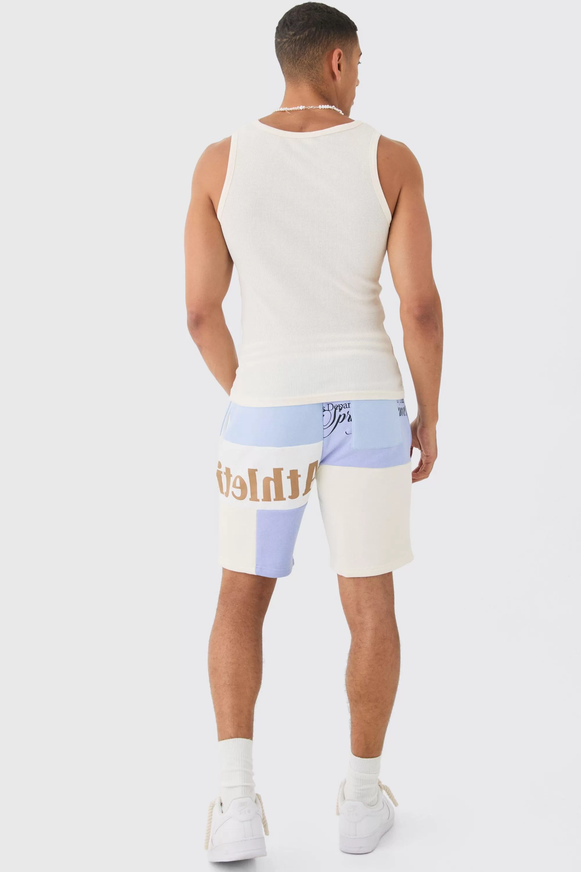 boohooMAN Loose Fit Graphic Patchwork Jersey Shorts | UK