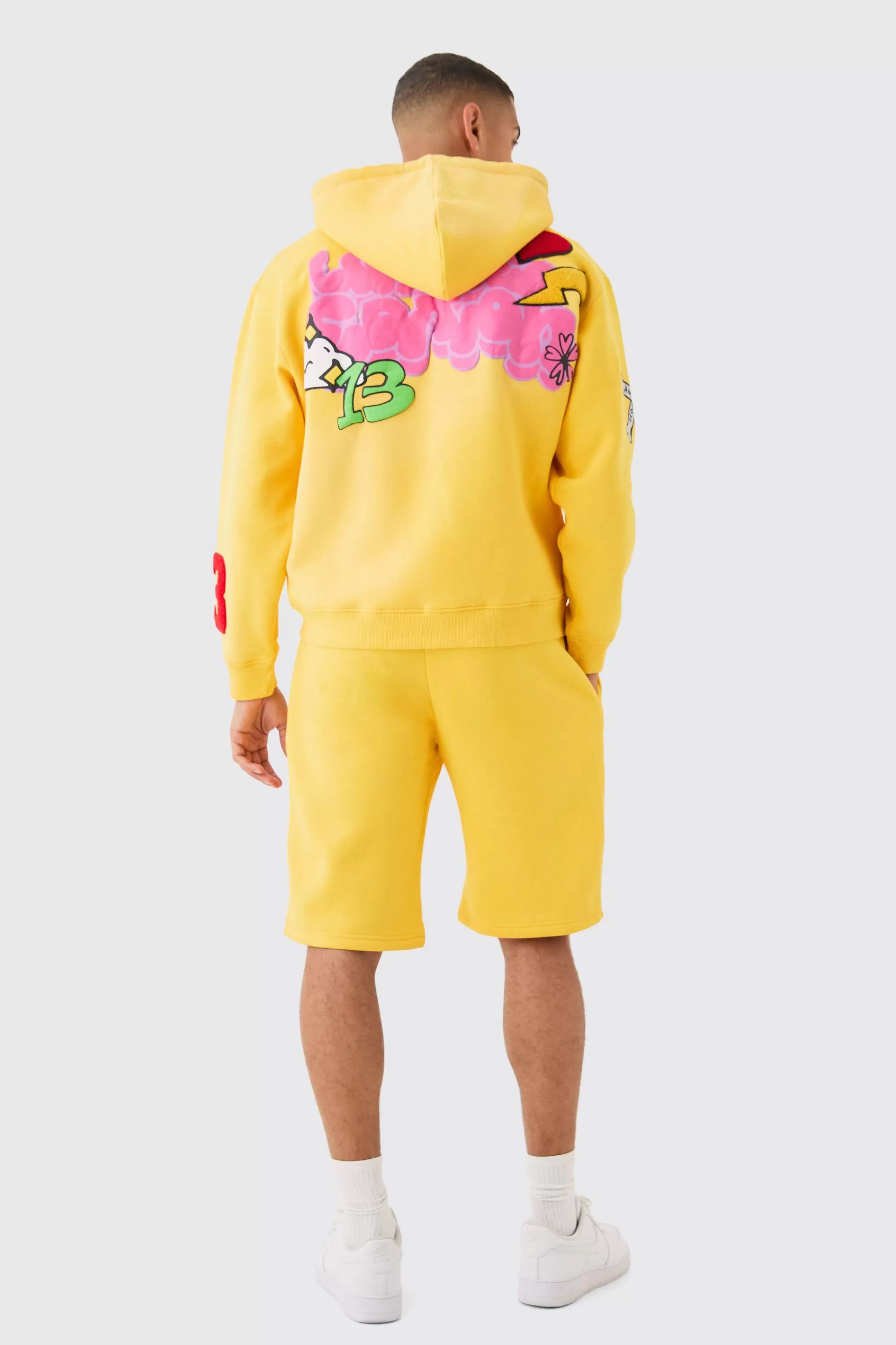 boohooMAN Loose Fit Ofcl Puff Print Shorts | UK