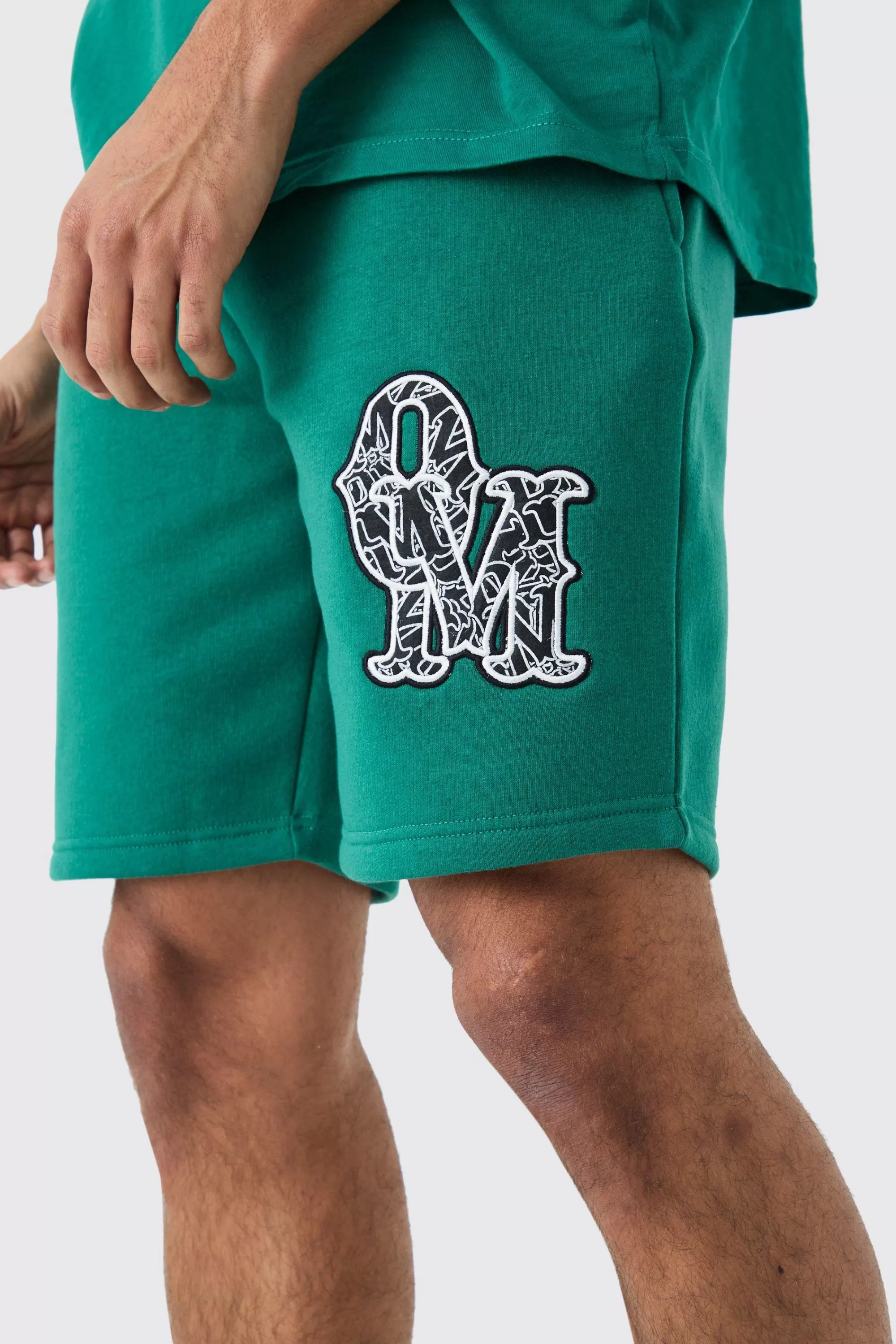 boohooMAN Loose Mid Length Applique Shorts | UK