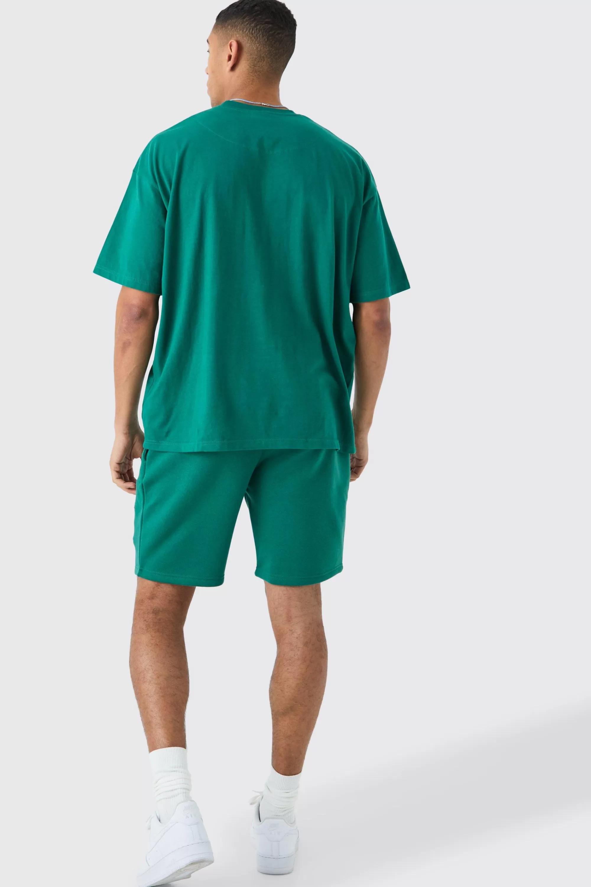 boohooMAN Loose Mid Length Applique Shorts | UK