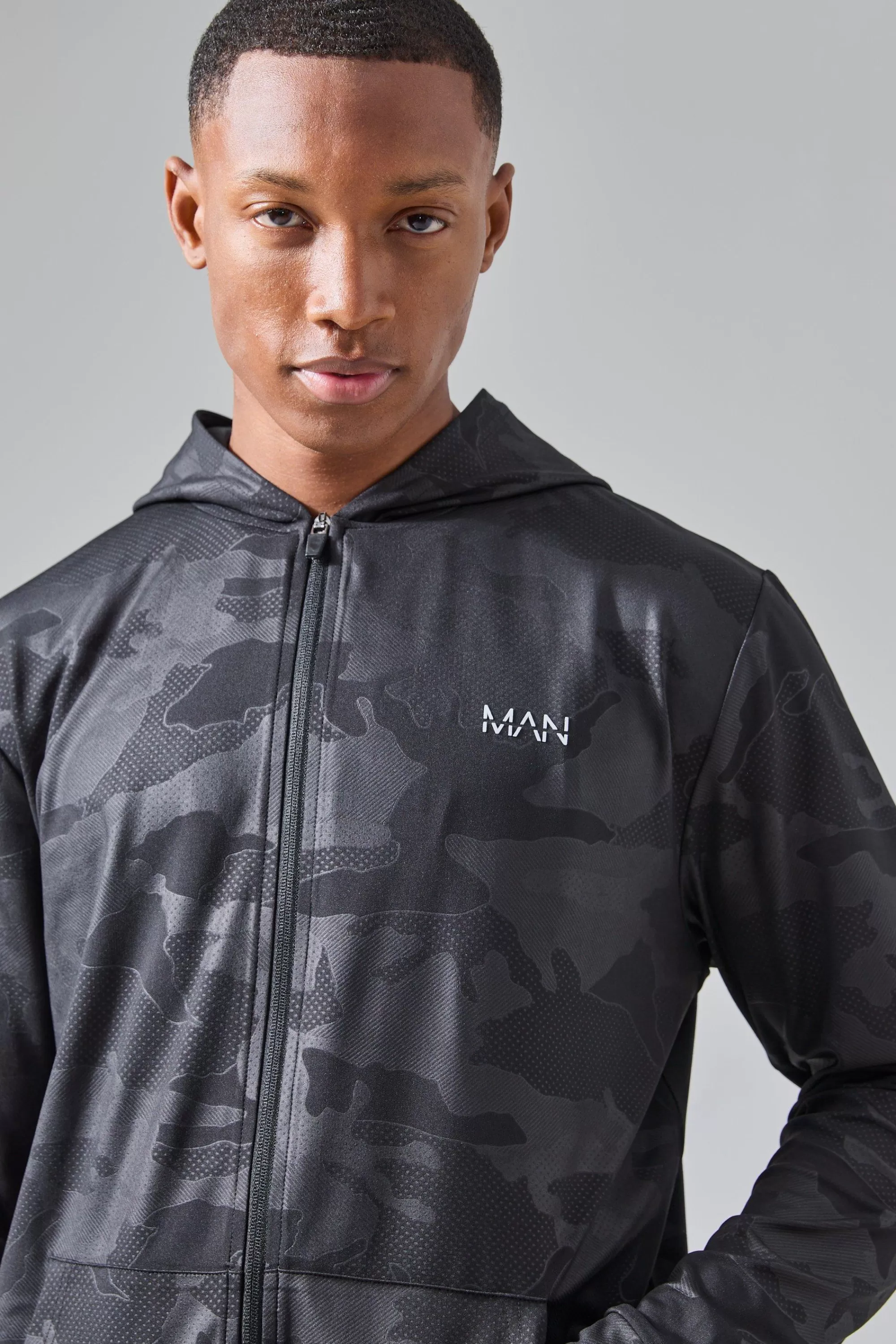 boohooMAN Man Active Camo Performance Regular Fit Zip Through Hoodie | UK