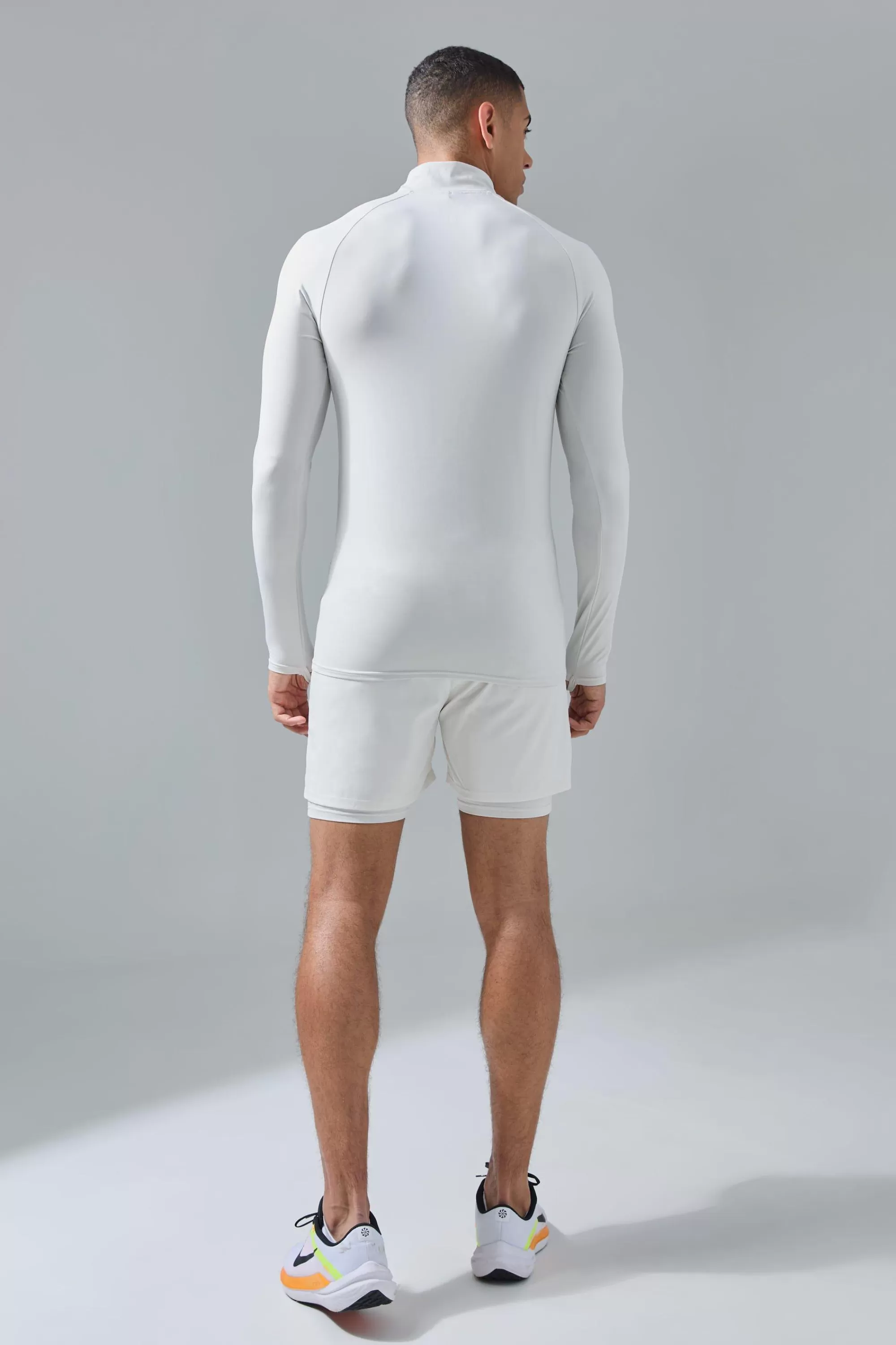 boohooMAN Man Active Muscle Fit 1/4 Zip Top | UK