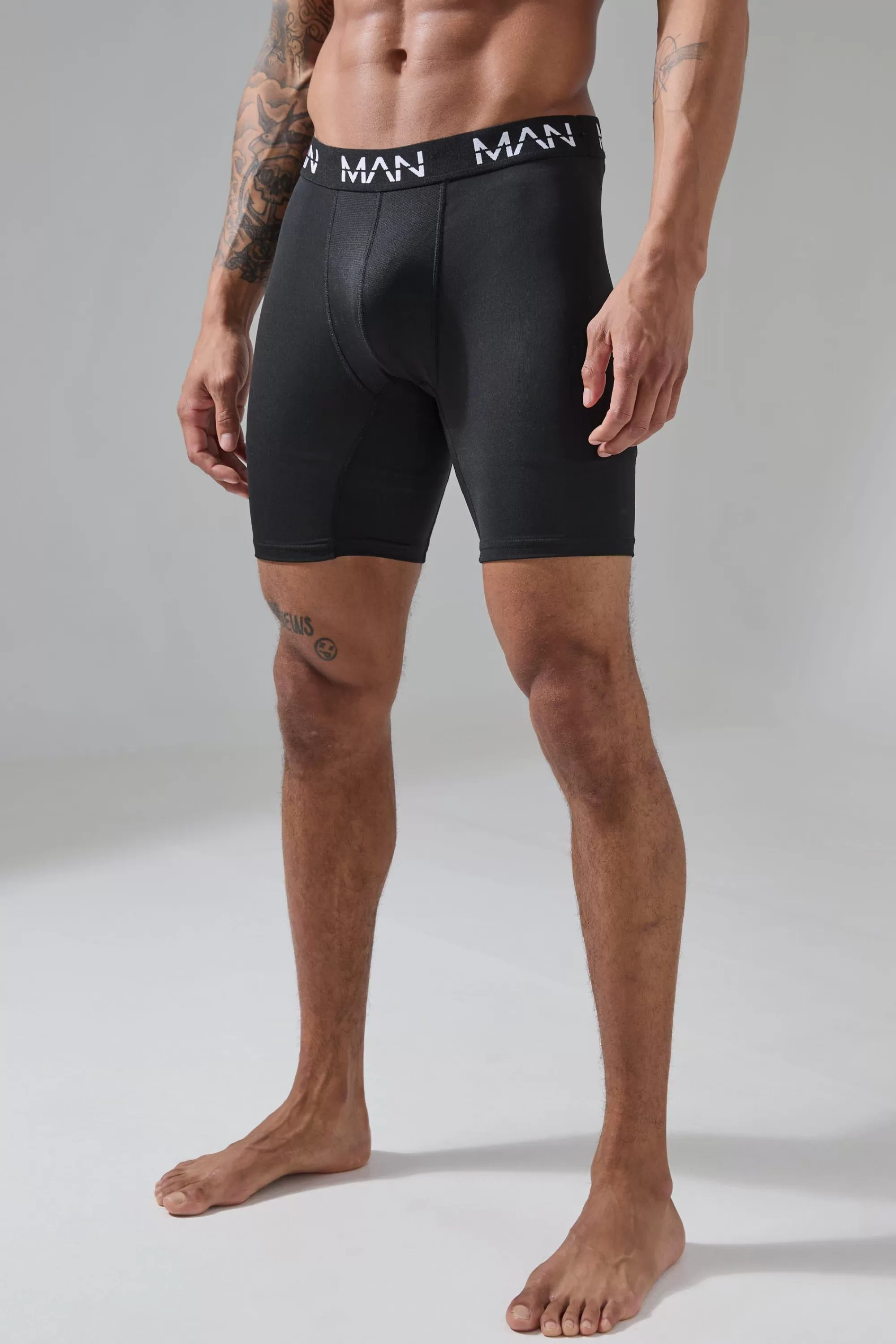 boohooMAN Man Active Performance 7inch Long Boxer | UK