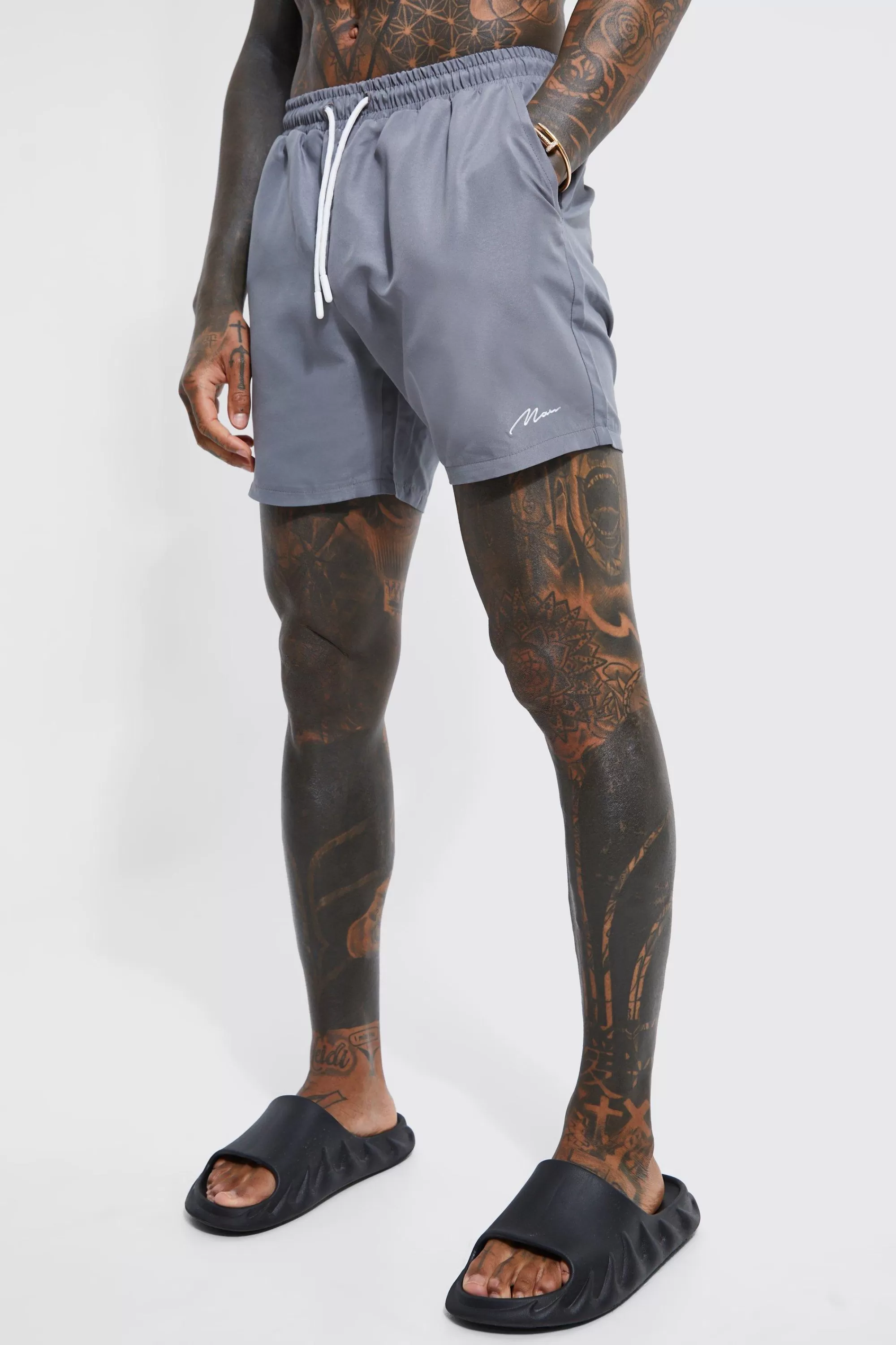 boohooMAN Man Signature Mid Length Swim Shorts | UK