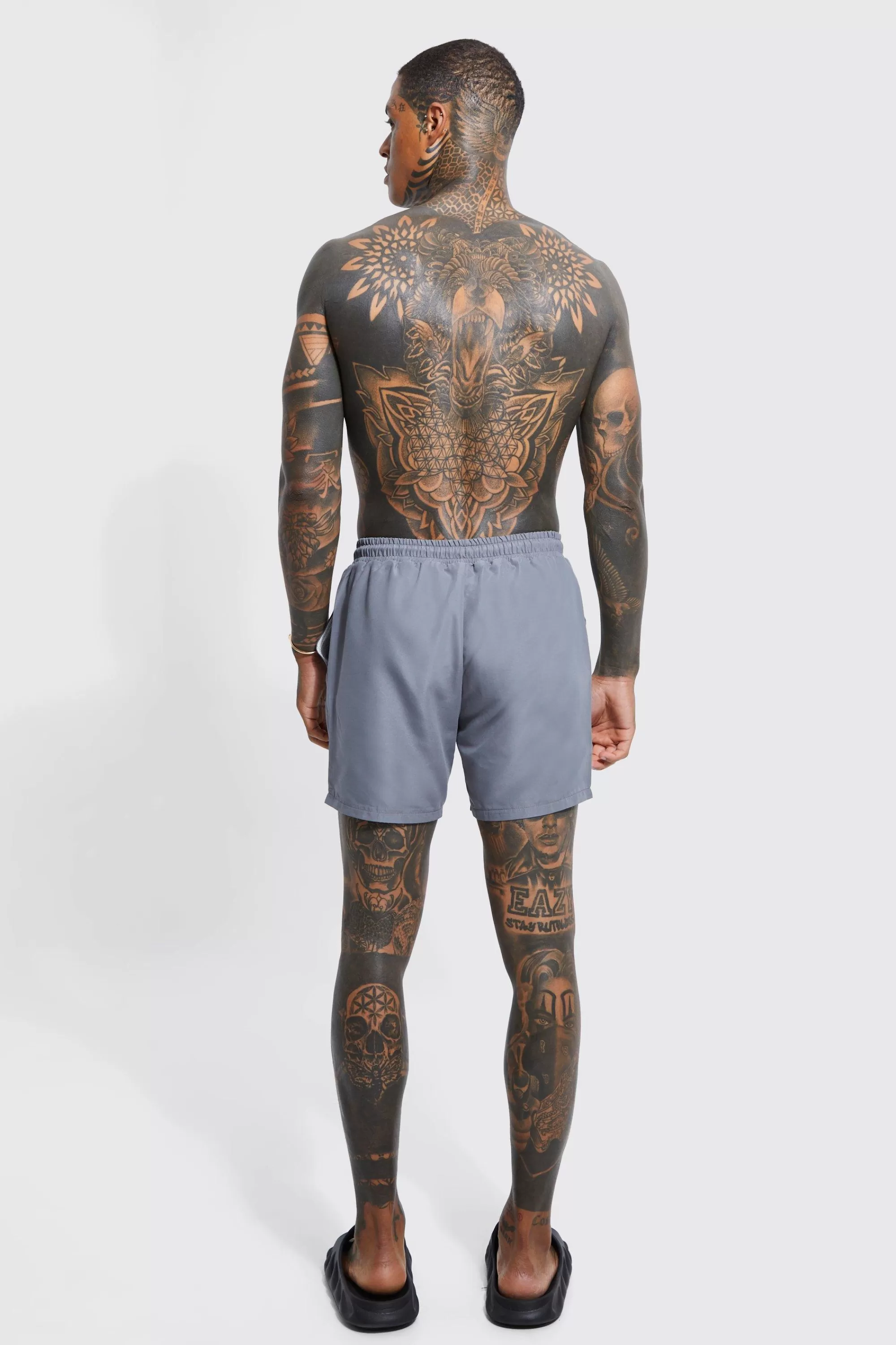 boohooMAN Man Signature Mid Length Swim Shorts | UK