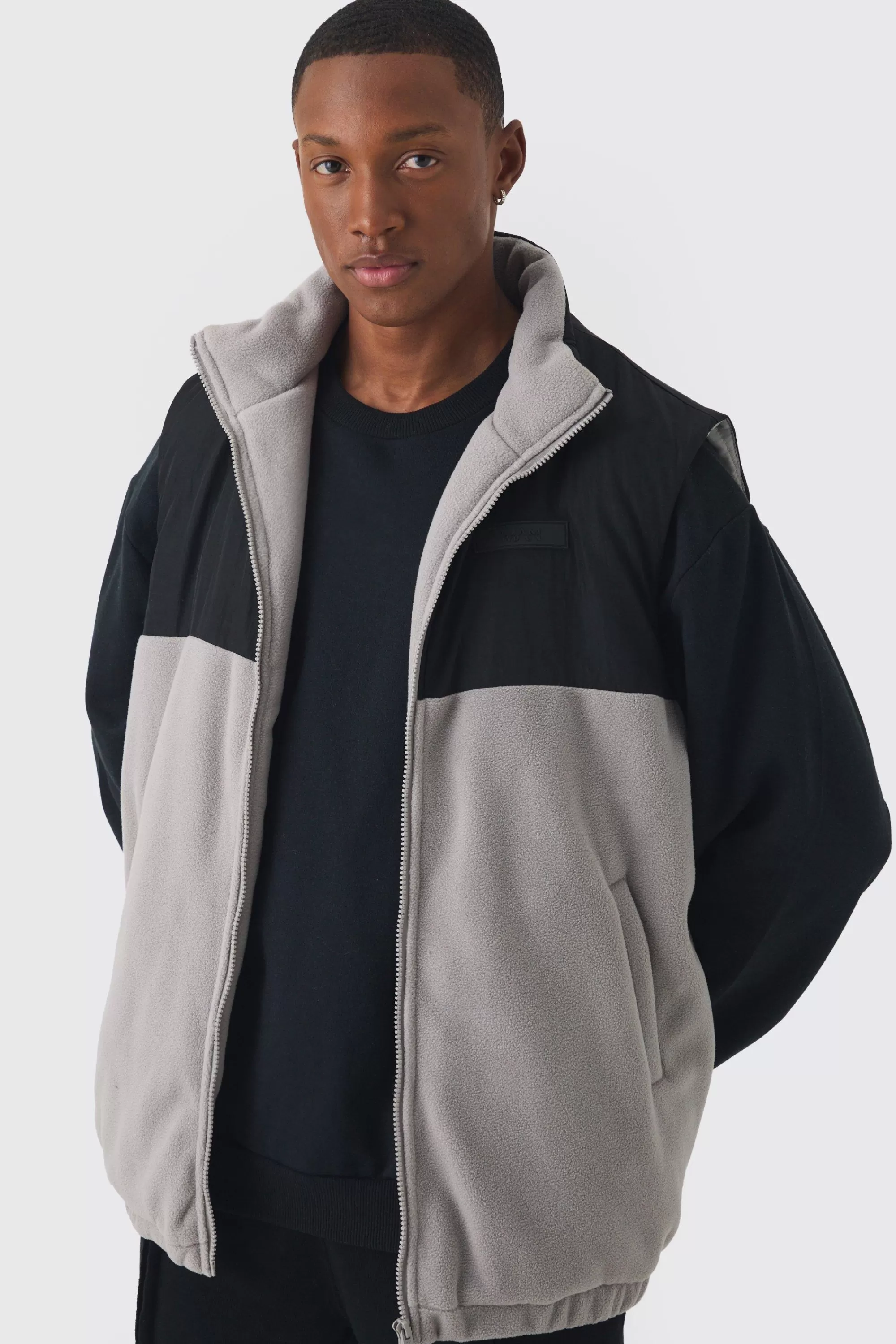 boohooMAN Man Tab Boxy Colour Block Fleece Gilet In | UK