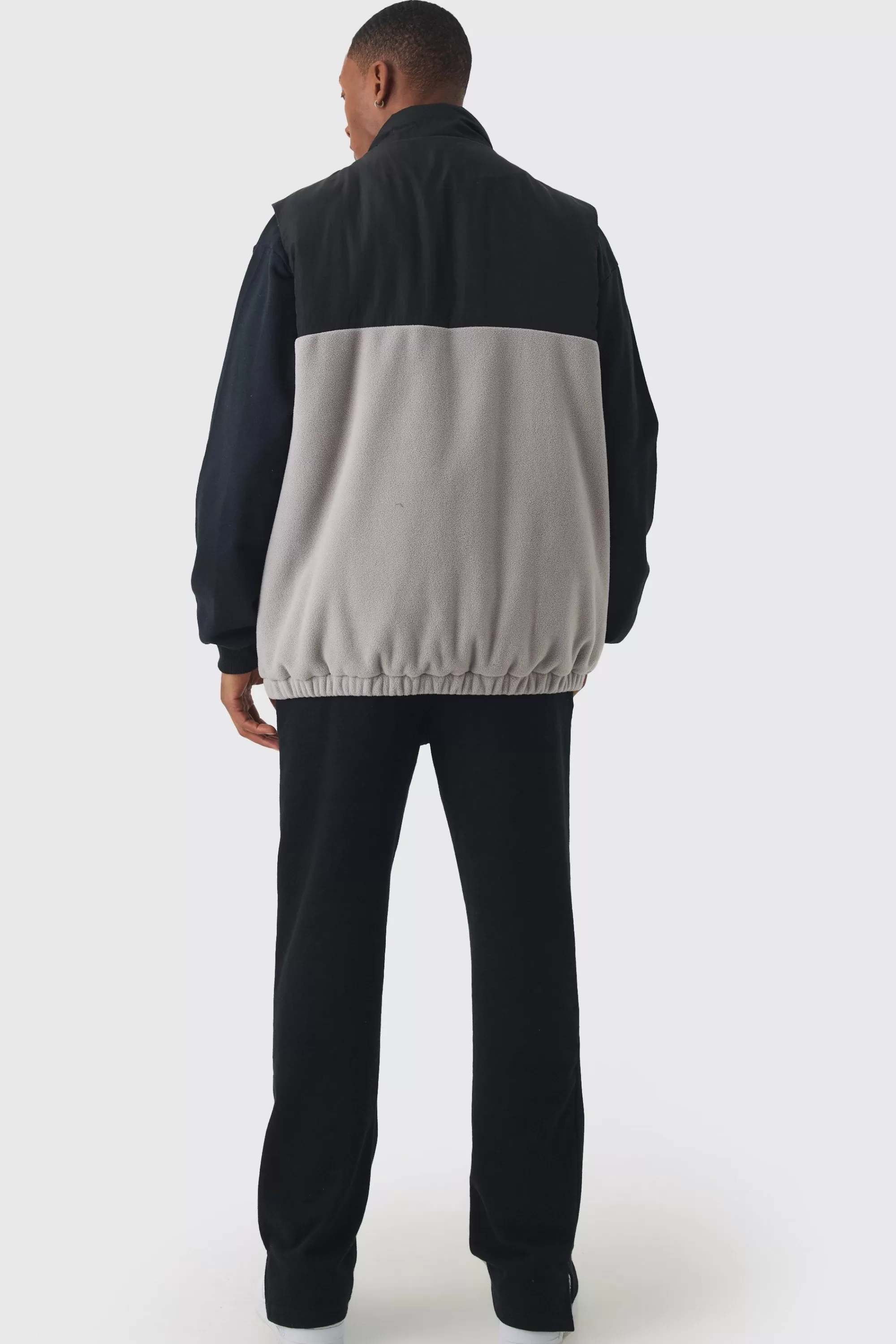 boohooMAN Man Tab Boxy Colour Block Fleece Gilet In | UK