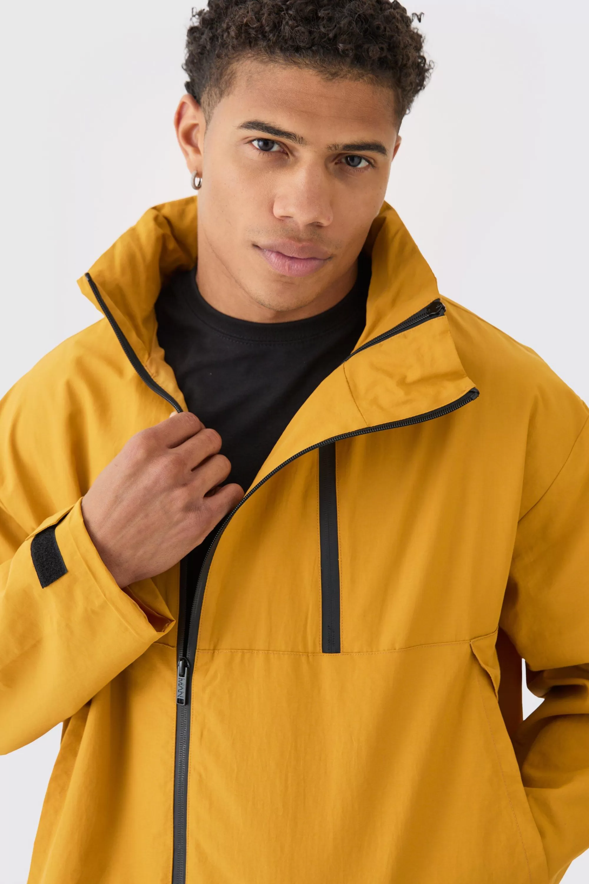 boohooMAN Man Tab Oversized Zip Detail Nylon Windbreaker In | UK