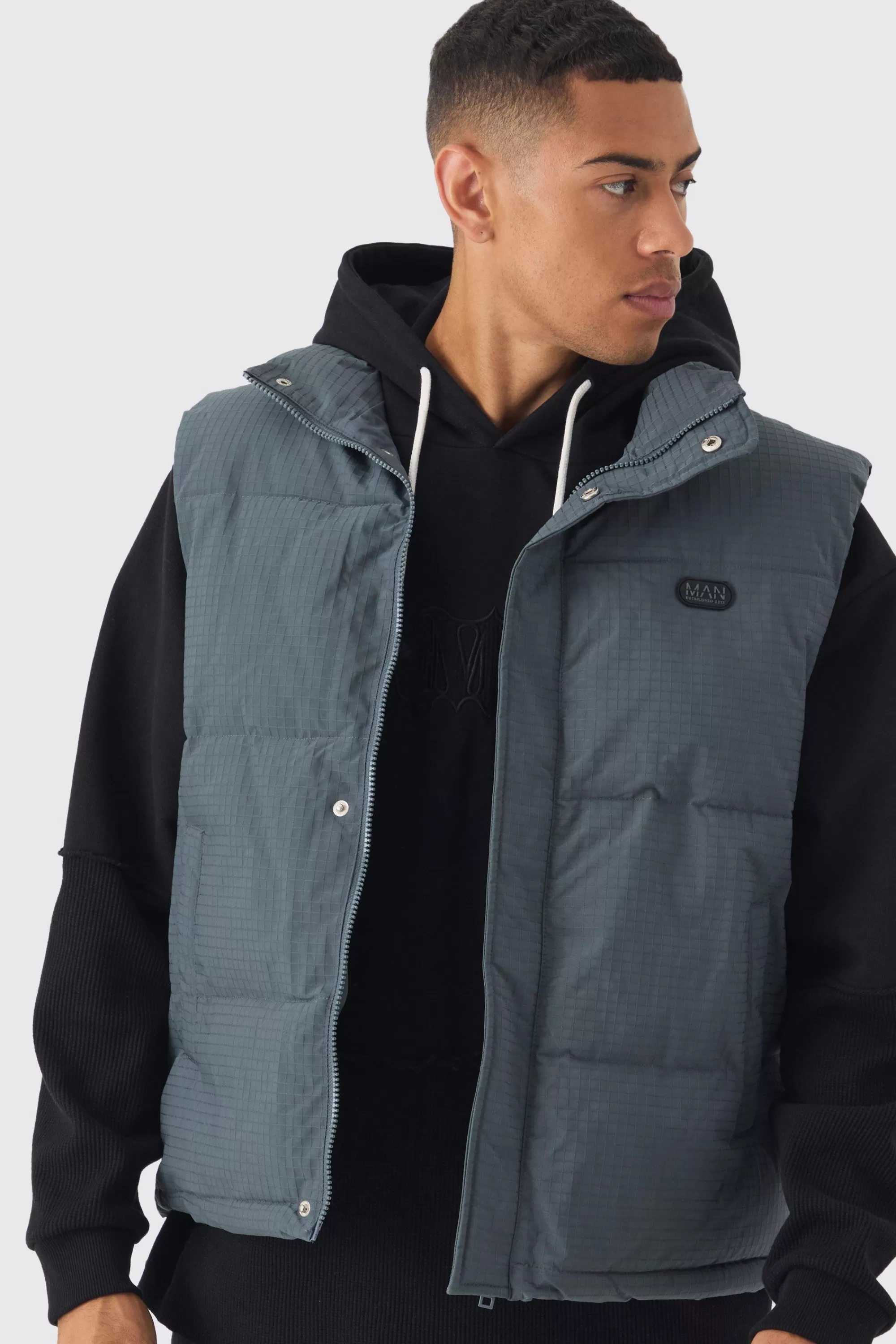 boohooMAN Man Tab Ripstop Funnel Neck Puffer Gilet In | UK